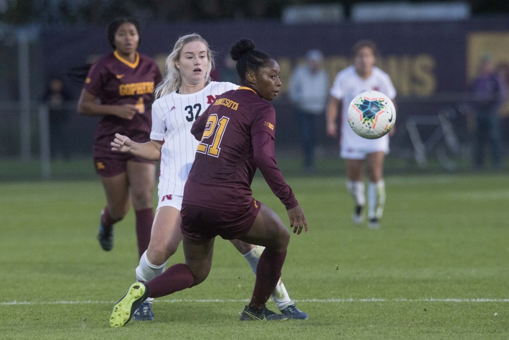 Defender Cachet Lue attempts to stop a pass from an opponent at Elizabeth Lyle Robbie Stadium on Thursday, Oct. 17. The Gophers went on to tie Nebraska 1-1. 