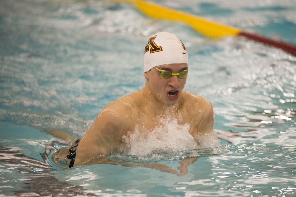 Sophomore Evan Yoder competes against the University of Florida at the Jean K. Freeman Aquatic Center on Friday, Oct. 11.