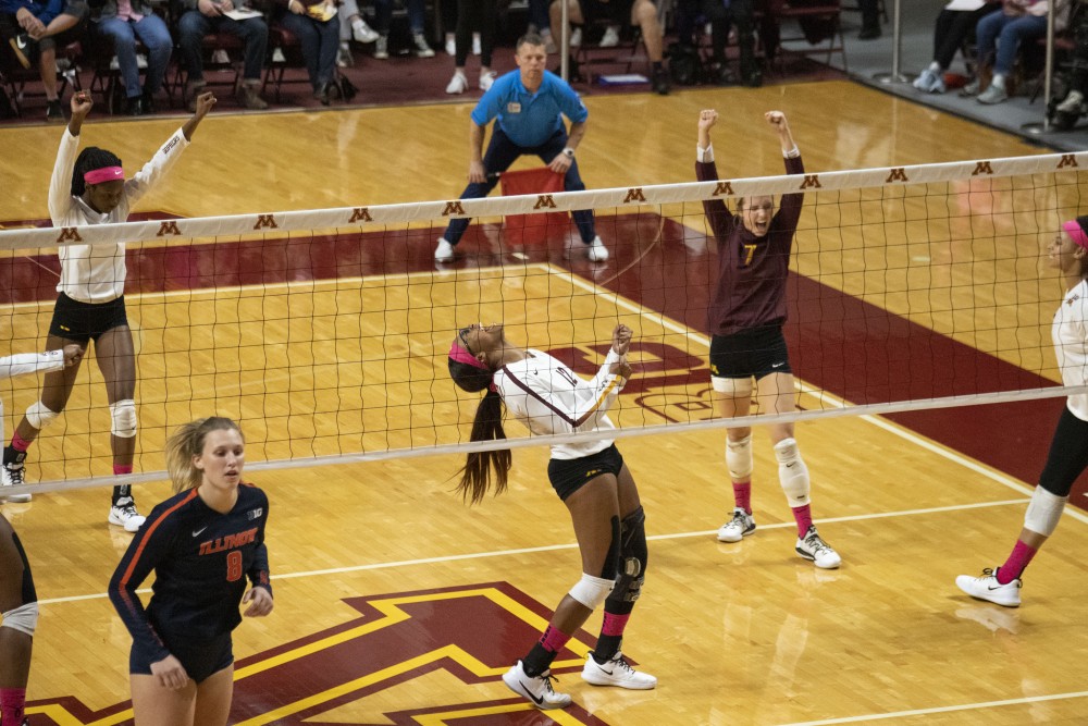 Middle Blocker Taylor Morgan celebrates a scored point at the Maturi Pavilion on Saturday, Oct. 19. The Gophers defeated Illinois three sets to one. 