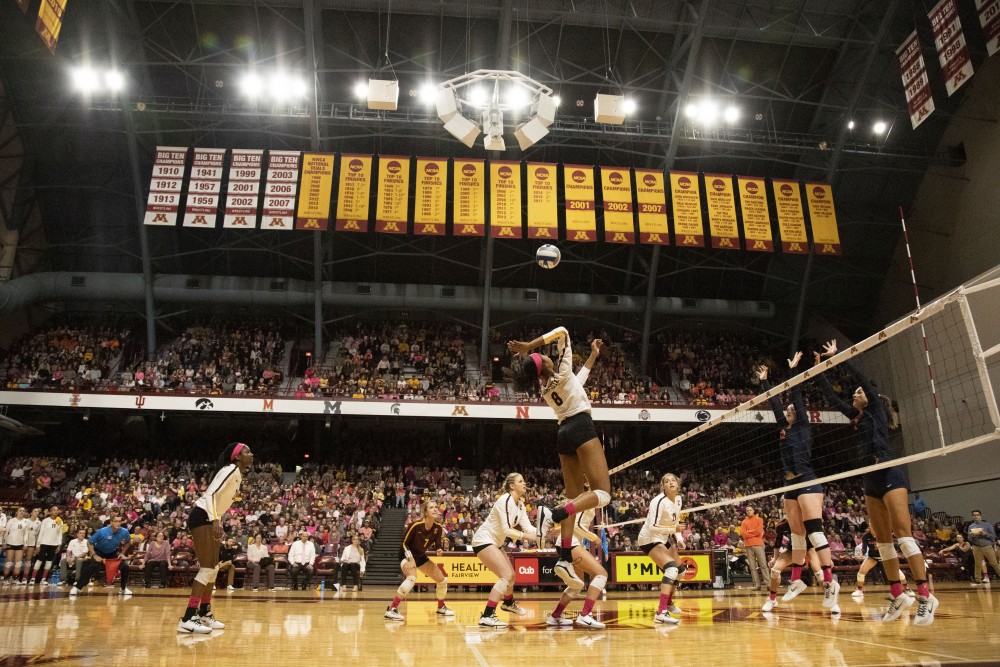 Outside Hitter Airi Miyabe jumps to spike the ball at the Maturi Pavilion on Saturday, Oct. 19, 2019. The Gophers defeated Illinois three sets to one. 