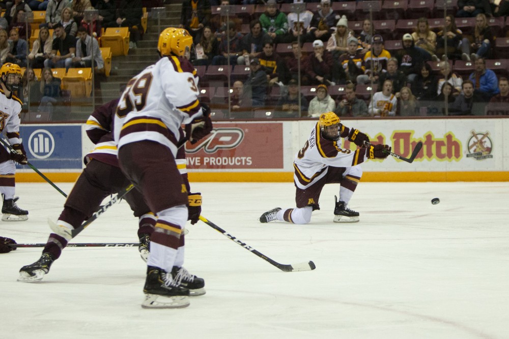 Forward Sammy Walker takes a shot on net at the 3M Arena at Mariucci on Friday, Oct. 25, 2019. The Gophers went on to lose 2-5 to the University of Minnesota Duluth. 