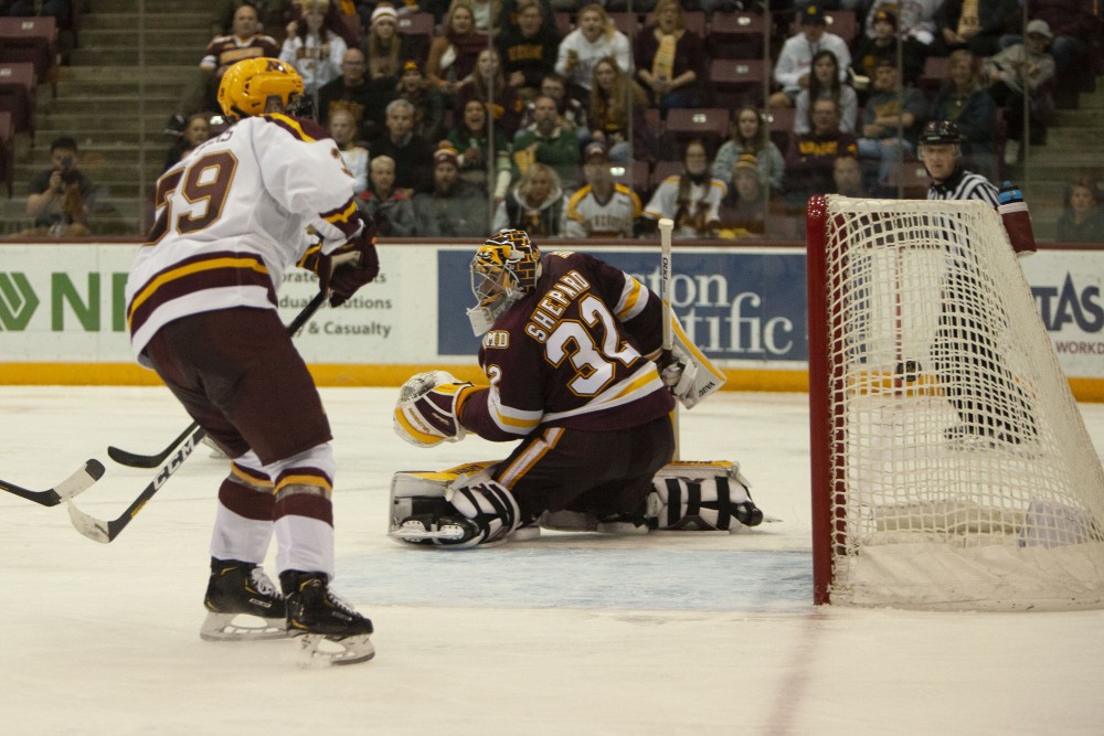 Forward Sammy Walkers shot enters the net at the 3M Arena at Mariucci on Friday, Oct. 25. The Gophers went on to lose 2-5 to the University of Minnesota Duluth. 