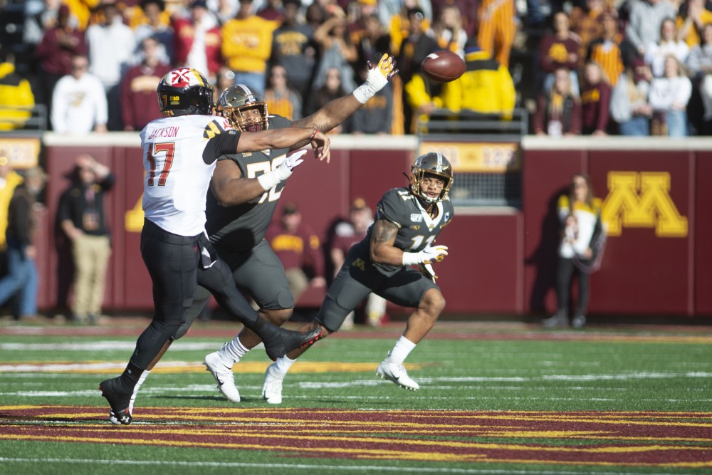 The Gophers look to block a Maryland pass at TCF Bank Stadium on Saturday, Oct. 26. The Gophers defeated Maryland 52-10 bringing their record to 8-0.