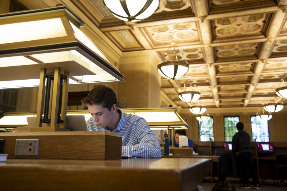 Sophomore Bradley Hartwyk works on an assignment in Walter Library on Friday, Oct. 26. The Universitys decision to transition lights to LEDs in heavy-traffic buildings is one initiative driven by its goal of eliminating 100 percent of carbon emissions by 2050. 