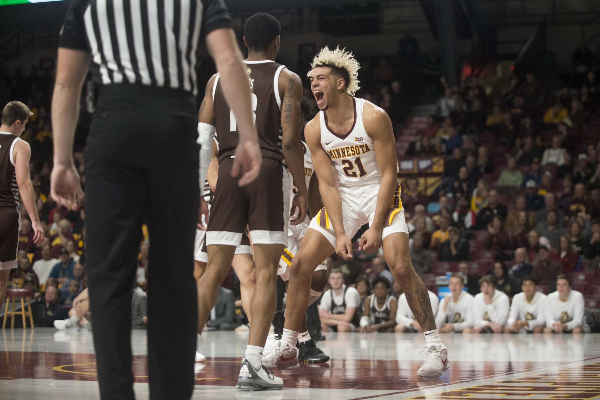 Forward Jarvis Omersa celebrates during the Gophers exhibition game against Southwest Minnesota State at Williams Arena on Monday, Oct 28. The Gophers won 73-48. 
