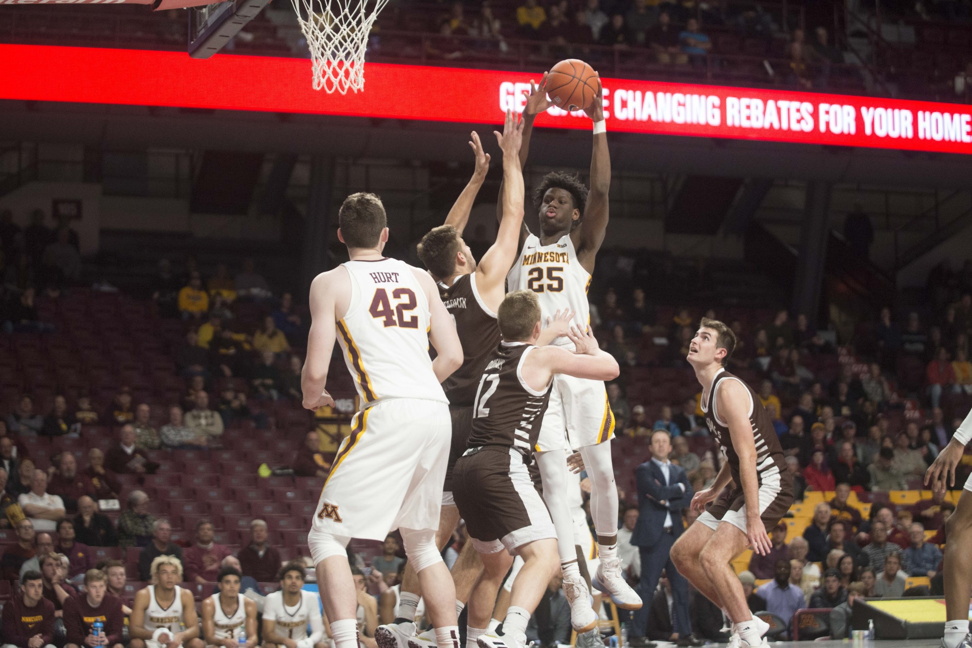 Center Daniel Oturu jumps for a rebound during the Gophers exhibition game against Southwest Minnesota State at Williams Arena on Monday, Oct 28. The Gophers won 73-48. (Sydni Rose / Minnesota Daily)