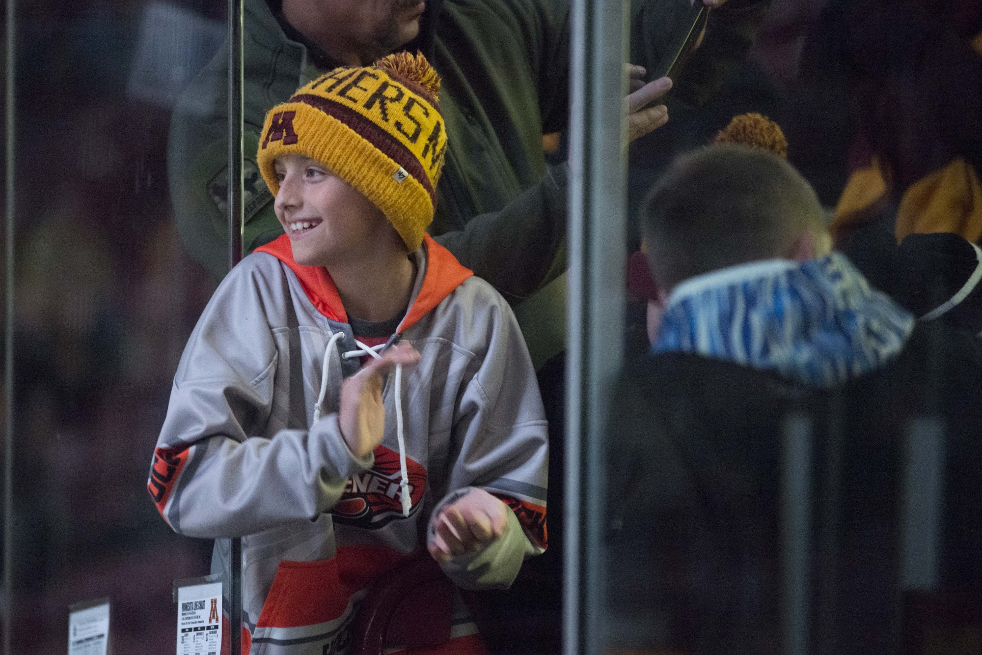 A Gopher fan watches as the game begins against the Notre Dame Fighting Irish at 3M Arena at Mariucci on Friday, Nov. 1. The Gophers won 3-2 in double overtime. 