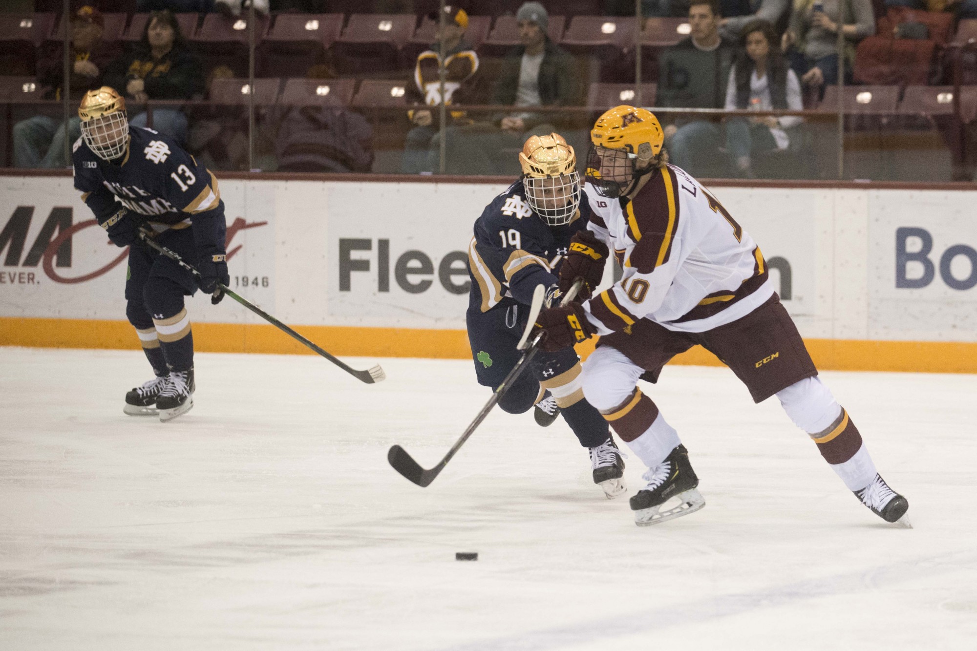 Defender Jackson Lacombe gains control of the puck during the game against the Notre Dame Fighting Irish at 3M Arena at Mariucci on Friday, Nov. 1. The Gophers won 3-2 in double overtime. 