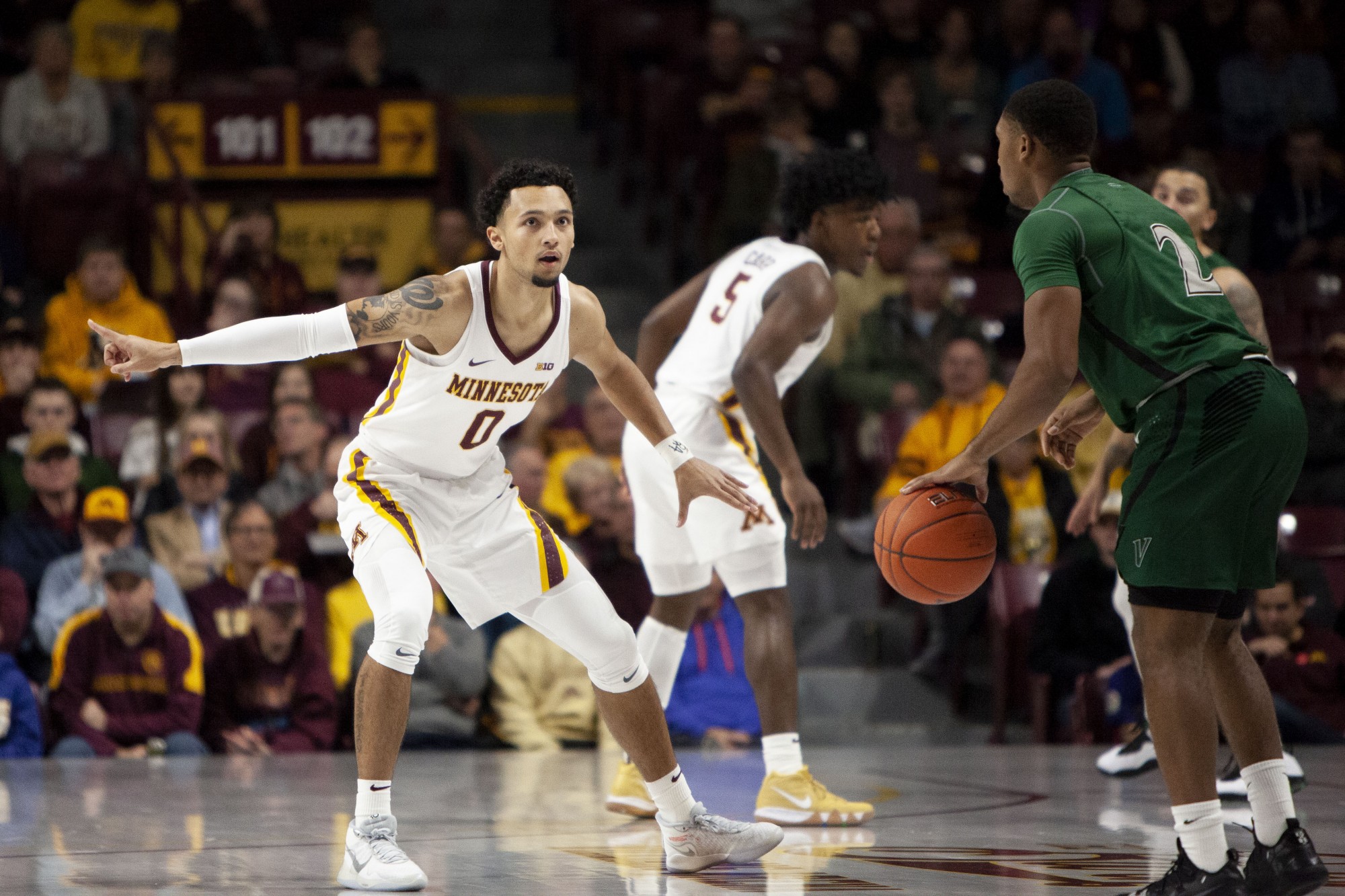 Guard Payton Willis signals to a teammate at Williams Arena on Tuesday, Nov. 5.  The Gophers went on to defeat Cleveland State 85-50. 