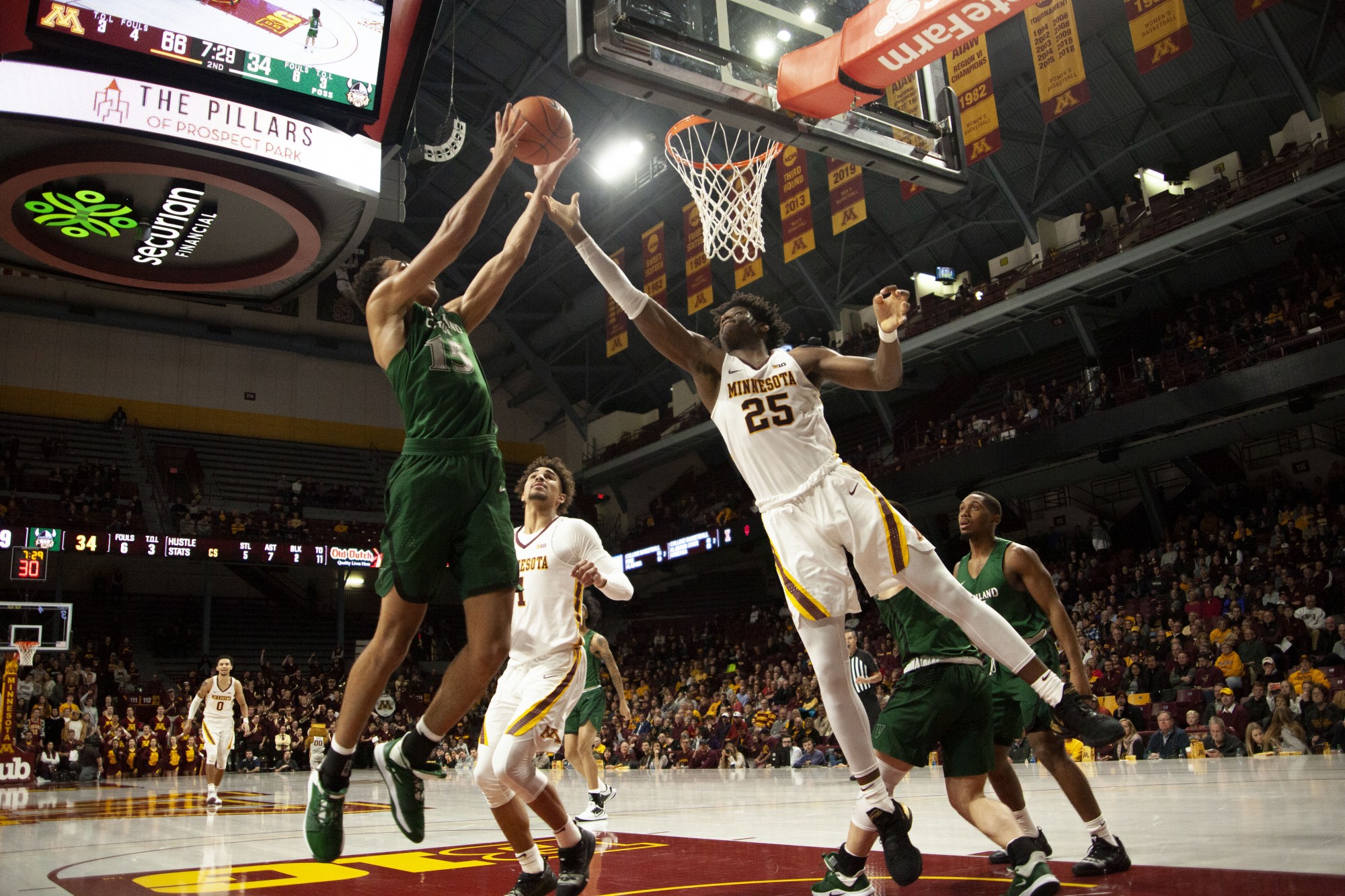 Center Daniel Oturu leaps to block an opponent at Williams Arena on Tuesday, Nov. 5. The Gophers went on to defeat Cleveland State 85-50. 