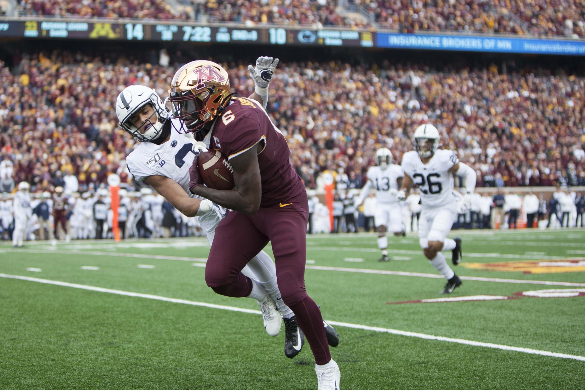 Wide receiver Tyler Johnson make a catch at TCF Bank Stadium on Saturday, Nov. 9. The Gophers defeated Penn State 31-26 to bring their record to 9-0. A first since 1904. 