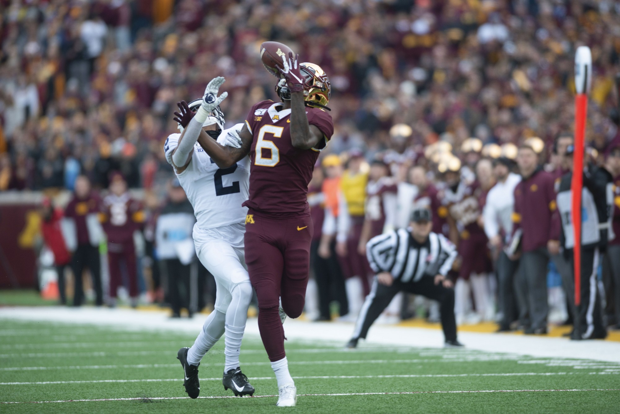 Wide receiver Tyler Johnson looks to catch a pass at TCF Bank Stadium on Saturday, Nov. 9.The Gophers defeated Penn State 31-26 to bring their record to 9-0. A first since 1904. 