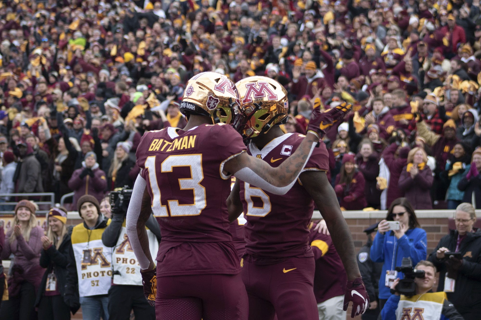 Wide receivers Rashod Bateman and Tyler Johnson embrace each other after a play at TCF Bank Stadium on Saturday, Nov. 9. The Gophers defeated Penn State 31-26 to bring their record to 9-0. A first since 1904. 