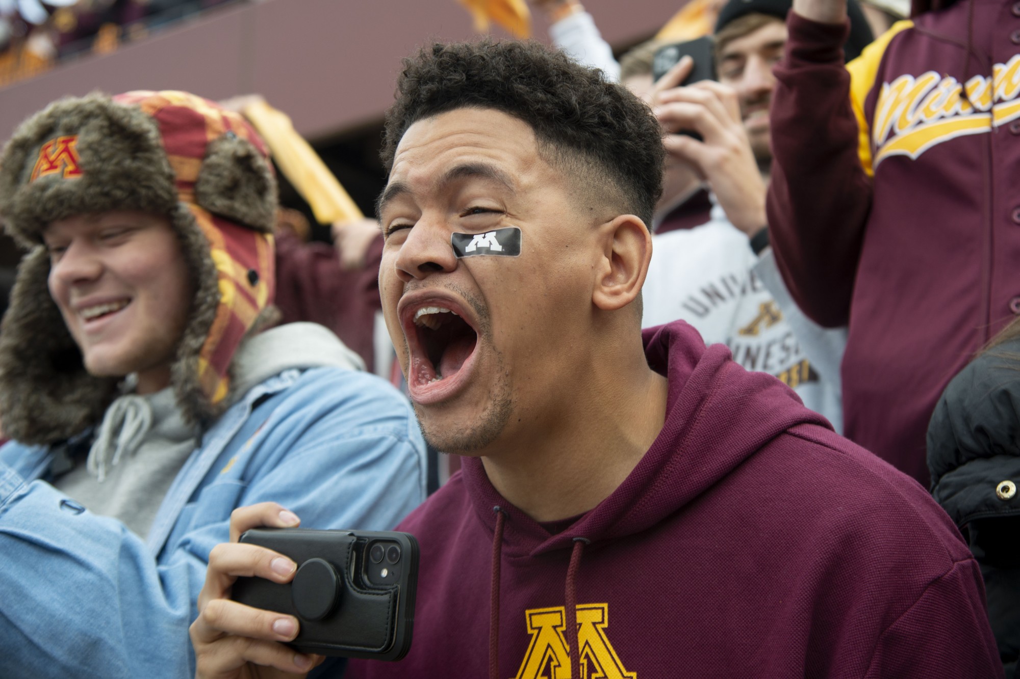 Fans cheer for the Gophers as they enter the field at TCF Bank Stadium on Saturday, Nov. 9. The Gophers defeated Penn State 31-26 to bring their record to 9-0. A first since 1904. 