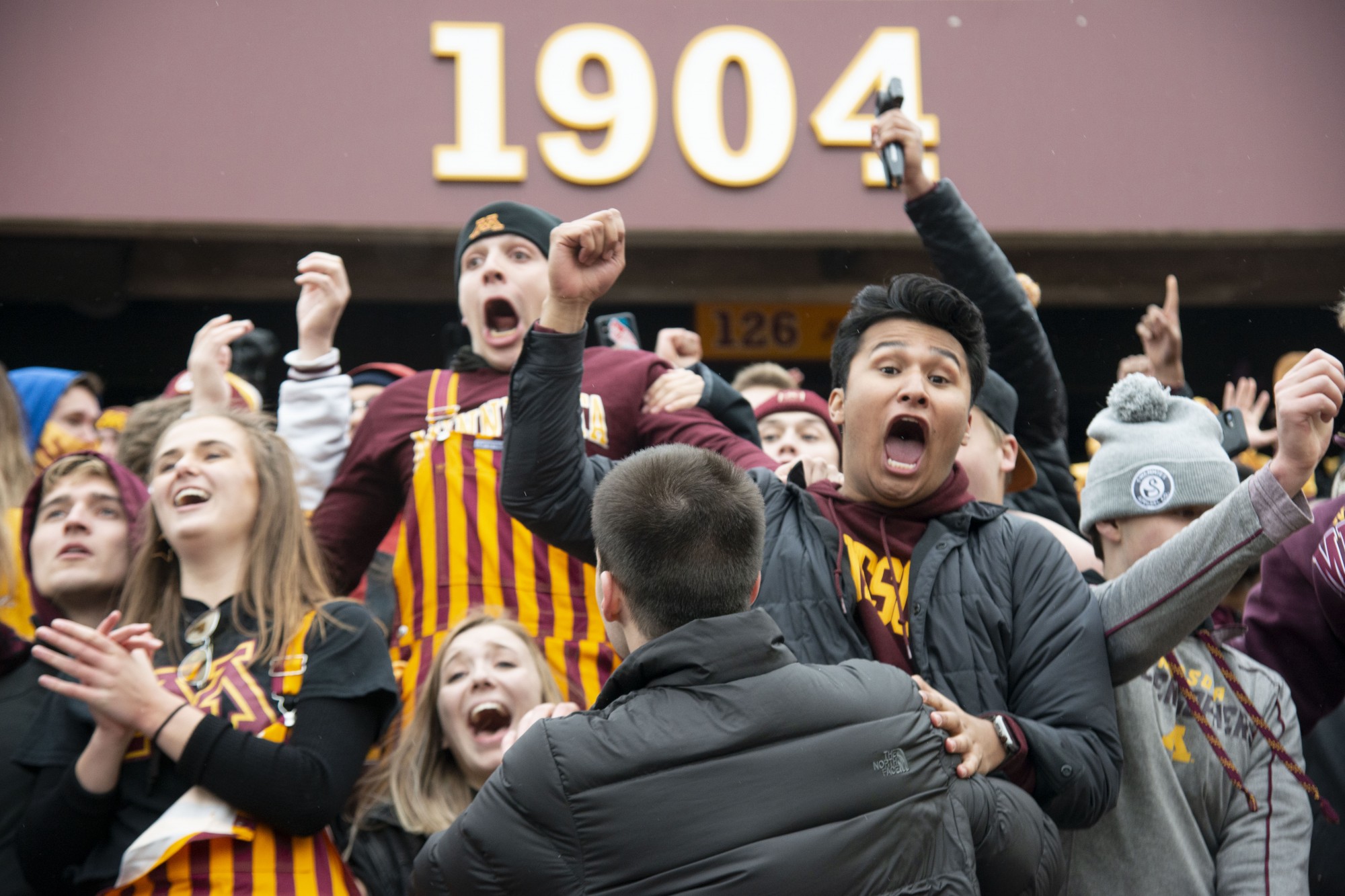 Fans cheer for the Gophers after winning the game against Penn State at TCF Bank Stadium Saturday, Nov. 9. The Gophers won 31-26 bringing their record to 9-0. A first since 1904.

