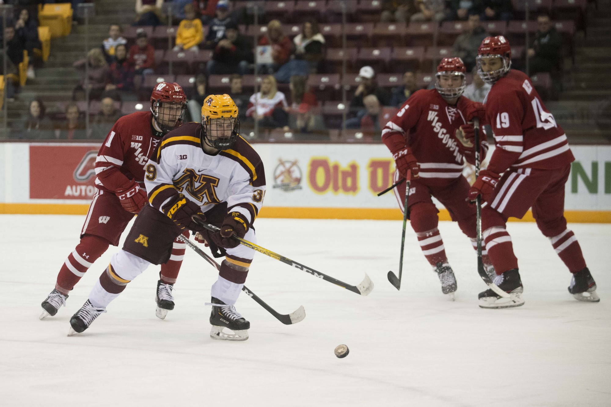 Forward Sammy Walker looks to control the puck during the game against the Wisconsin Badgers at 3M Arena at Mariucci on Friday, Nov. 22, 2019. The Gophers won 4-1. 