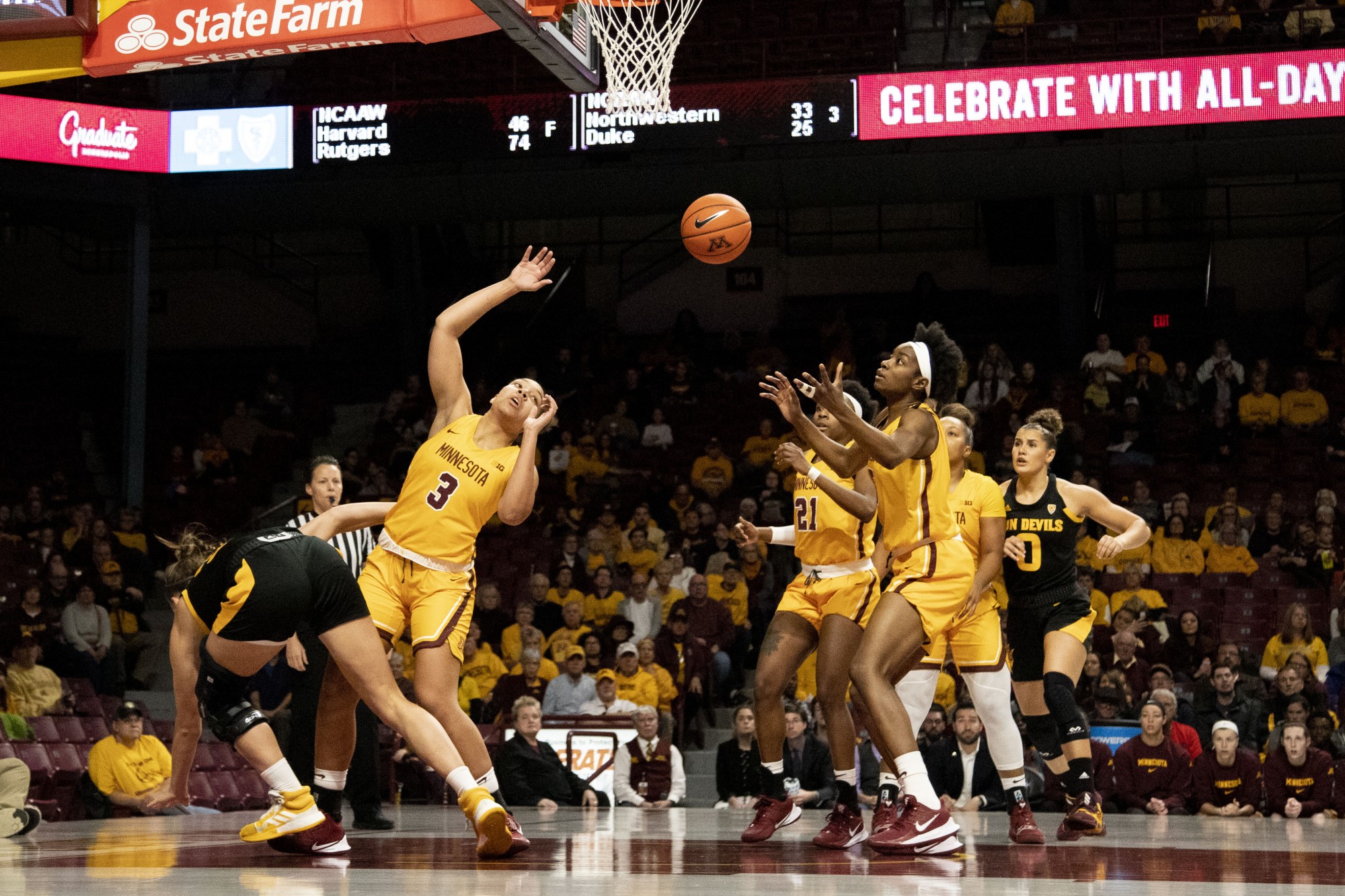 The Gophers look to recover a rebound during the game against Arizona State at Williams Arena on Sunday, Nov. 17. The Gophers defeated the Sun Devils 80-66. 
