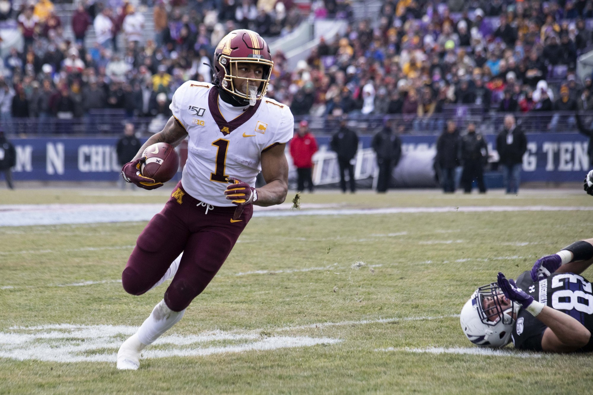 Running back Rodney Smith carries the ball at Ryan Field during the game against the Northwestern Wildcats on Saturday, Nov. 23. The Gophers earned a 38-22 victory bringing their record to 10-1. 