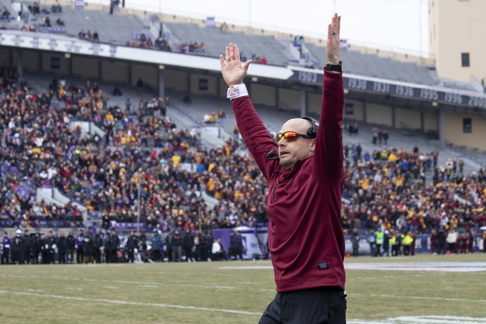 Head Coach P.J. Fleck signals a touchdown at Ryan Field during the game against the Northwestern Wildcats on Saturday, Nov. 23. The Gophers earned a 38-22 victory bringing their record to 10-1. 