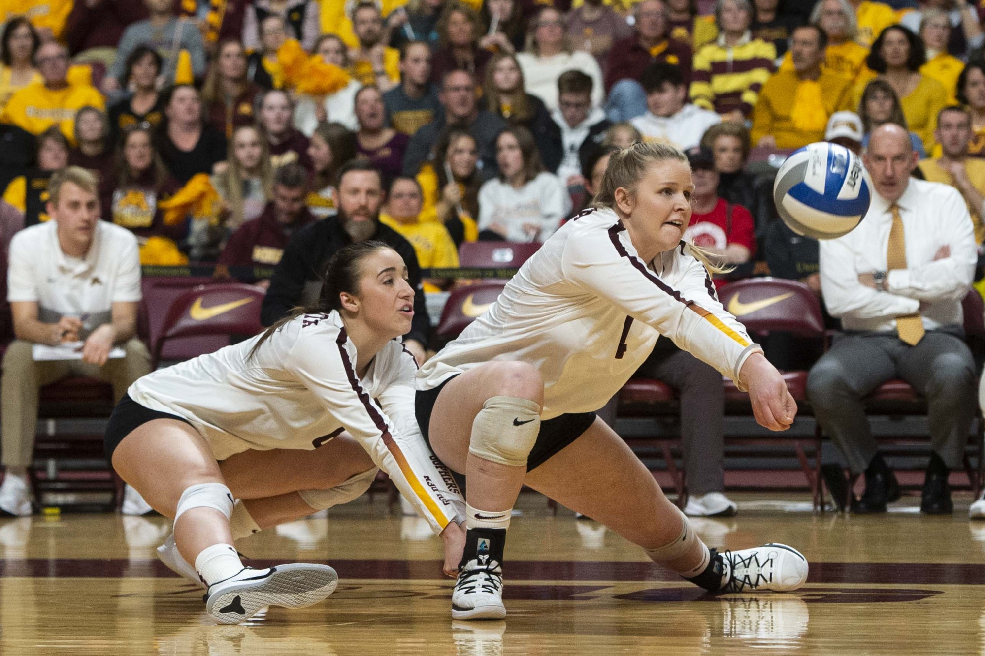 Libero Rachel Kilkelly and Outside Hitter Claire Sheehan dive for the ball at the Maturi Pavilion on Friday, Nov. 22. The Gophers took Nebraska to five sets but ultimately fell 3-2. 