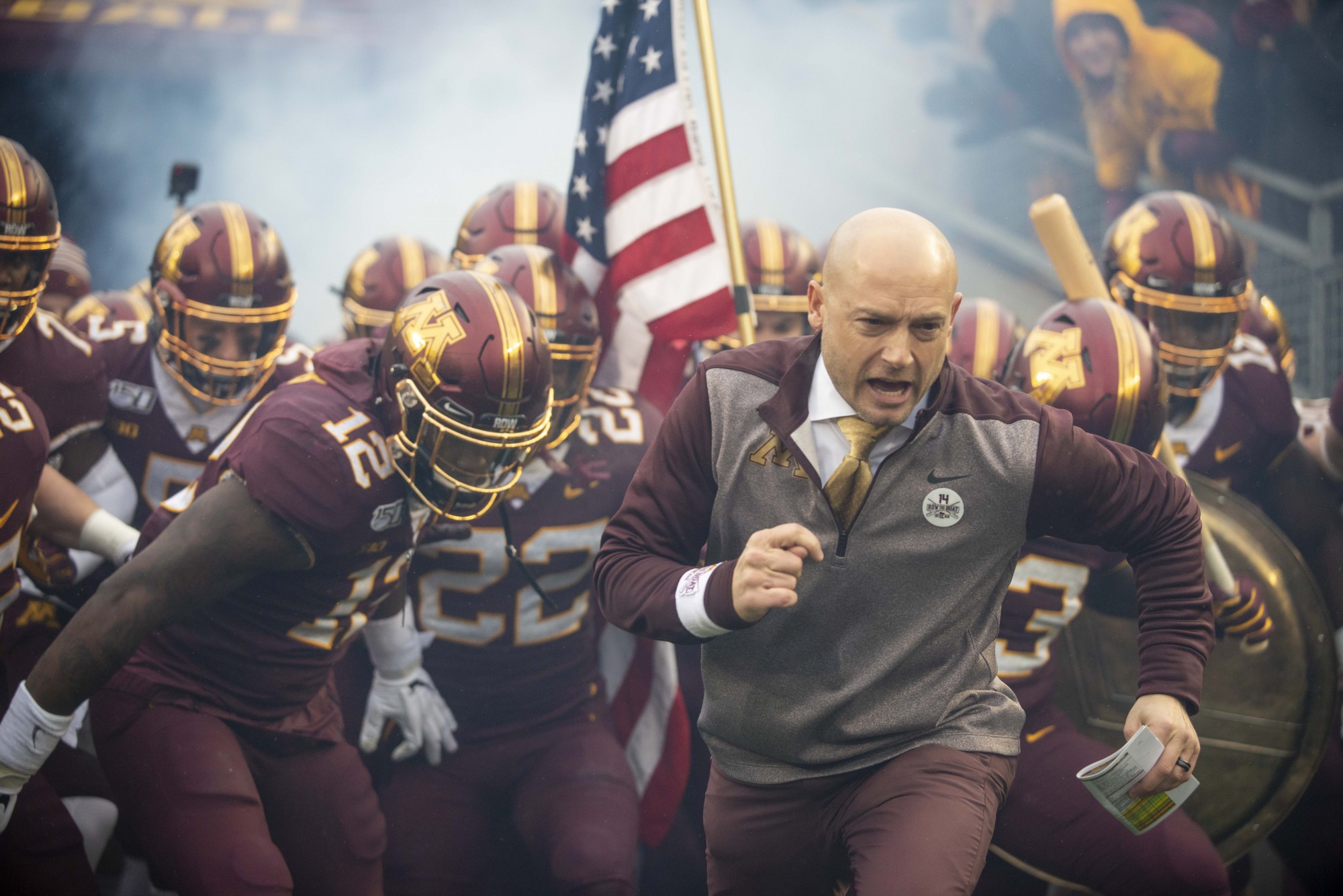 The Gophers make their entrance onto the field at TCF Bank Stadium on Saturday, Nov. 30, 2019.