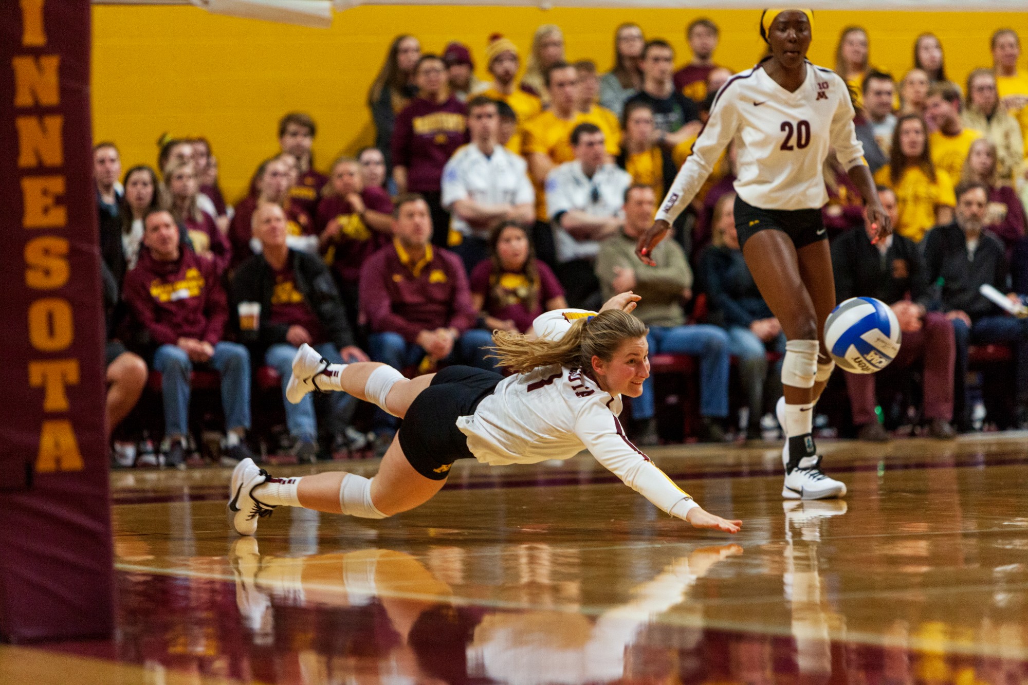Setter Tamara Dolonga dives for the ball at the Maturi Pavilion on Thursday, Nov. 14. The Gophers ended the night with a 3-1 loss against the Badgers. 