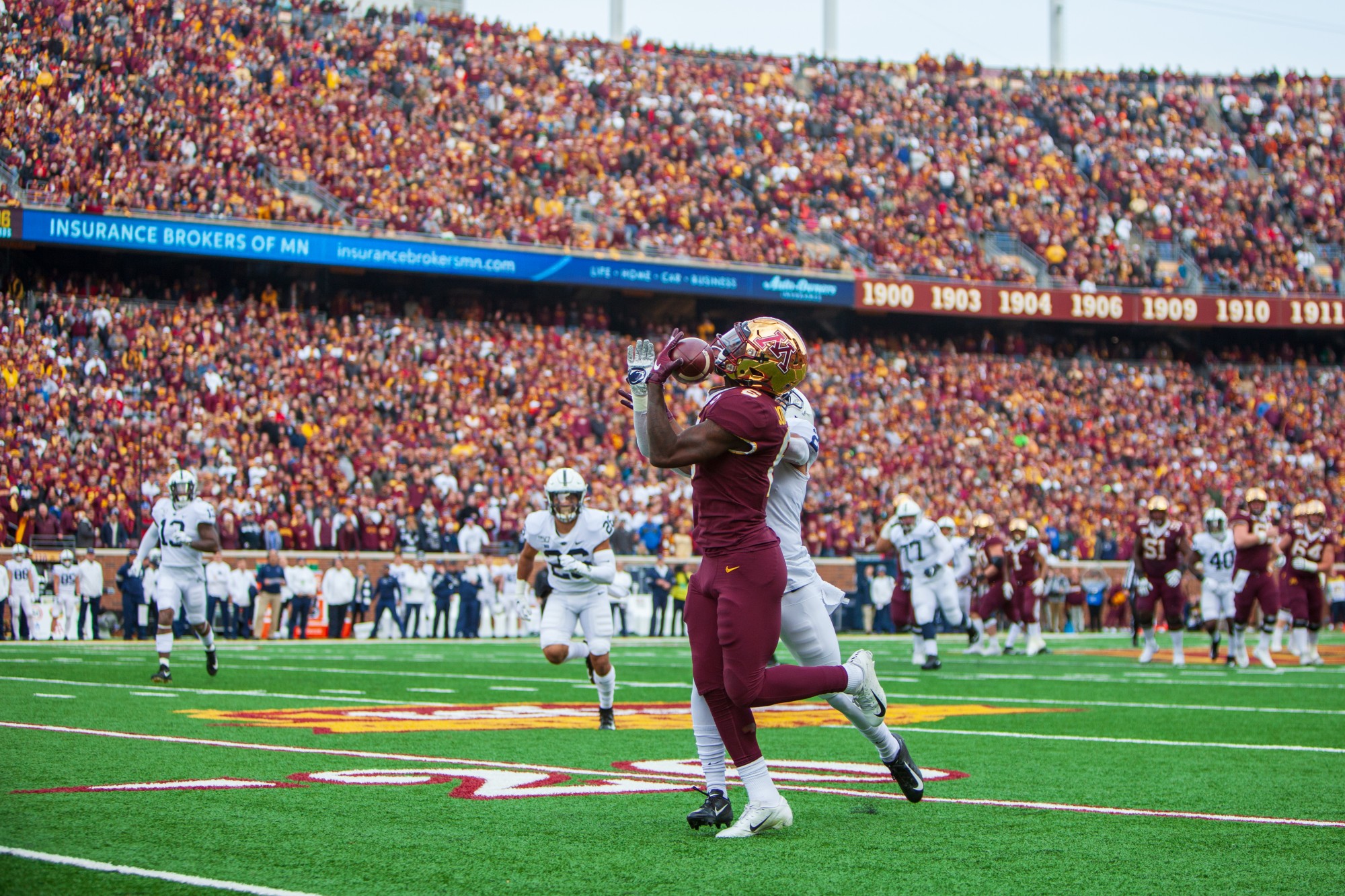 Wide receiver Tyler Johnson make a catch at TCF Bank Stadium on Saturday, Nov. 9. The Gophers defeated Penn State 31-26 to bring their record to 9-0. A first since 1904. 