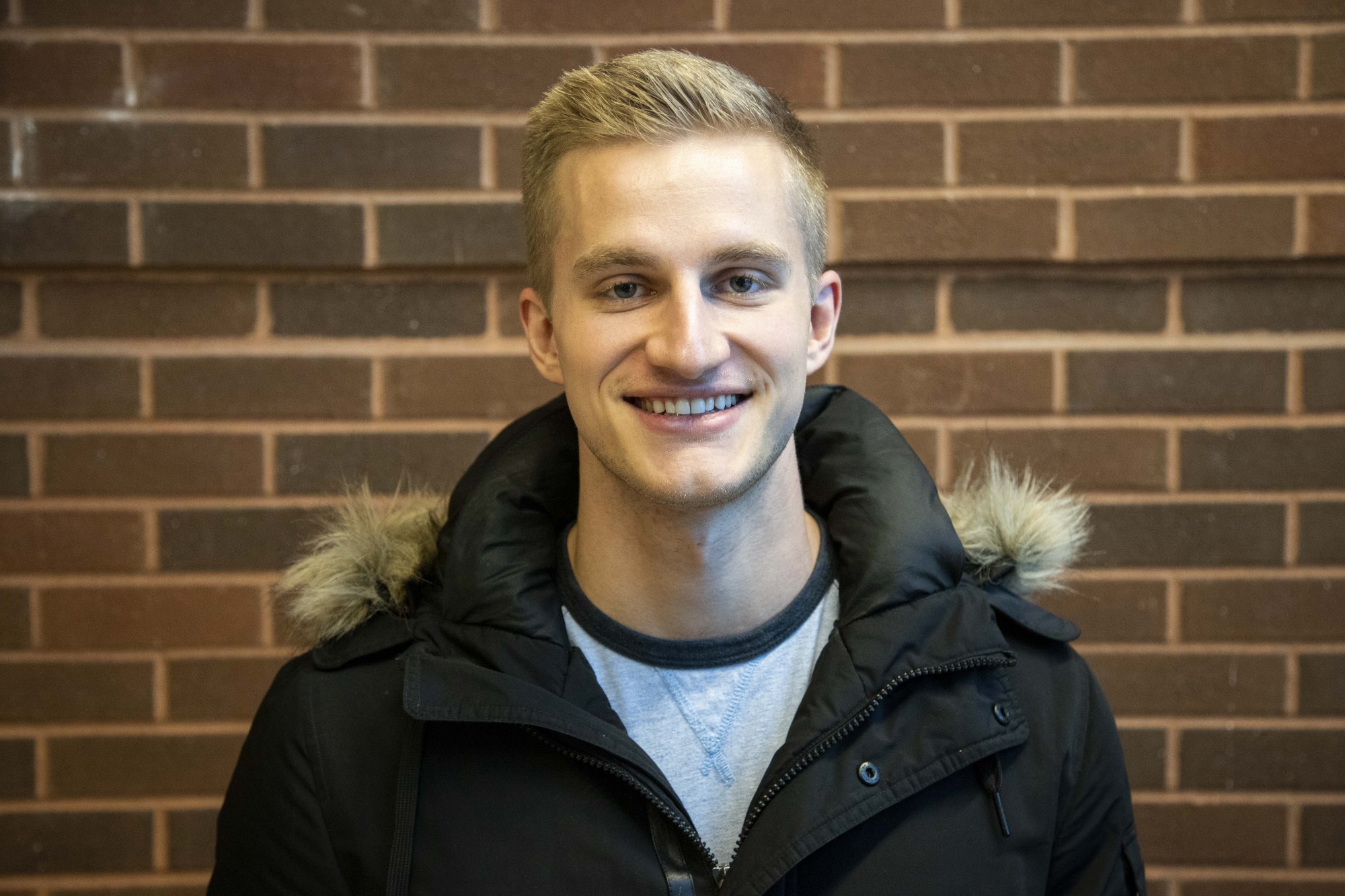 Jackson Baril poses for a portrait in the Carlson School of Management on Tuesday, Dec. 3. 
