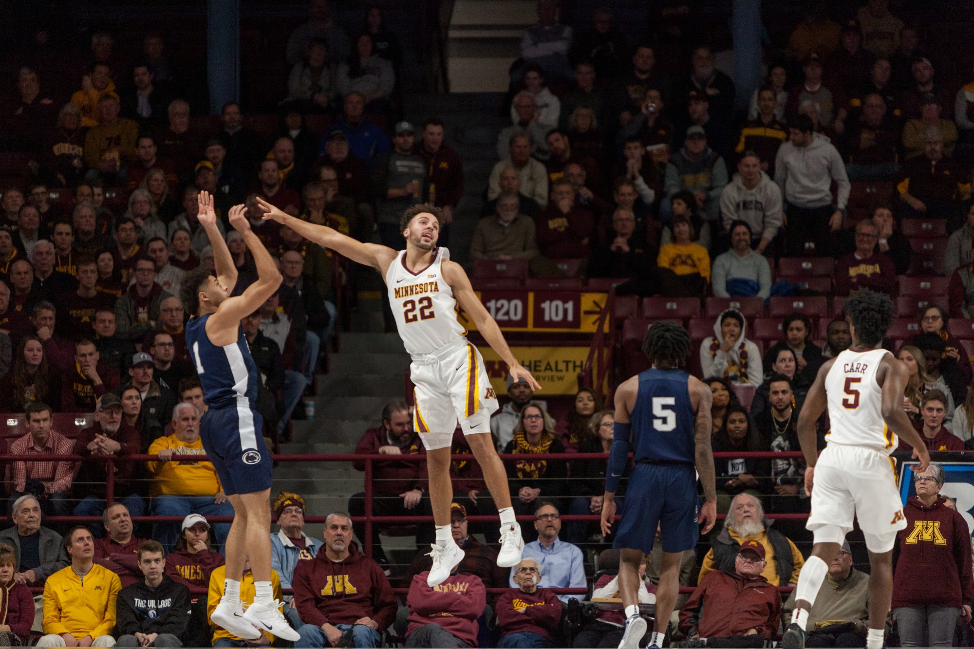 Gophers Guard Gabe Kalscheur leaps to block a shot at Williams Arena on Wednesday, Jan. 15.  Minnesota defeated the Penn State Nittany Lions 75-69. (Kamaan Richards / Minnesota Daily)