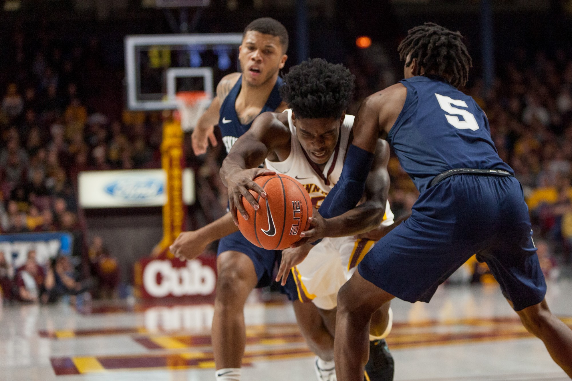 Gophers Guard Marcus Carr makes contact with a defender at Williams Arena on Wednesday, Jan. 15.  Minnesota defeated the Penn State Nittany Lions 75-69. (Kamaan Richards / Minnesota Daily)