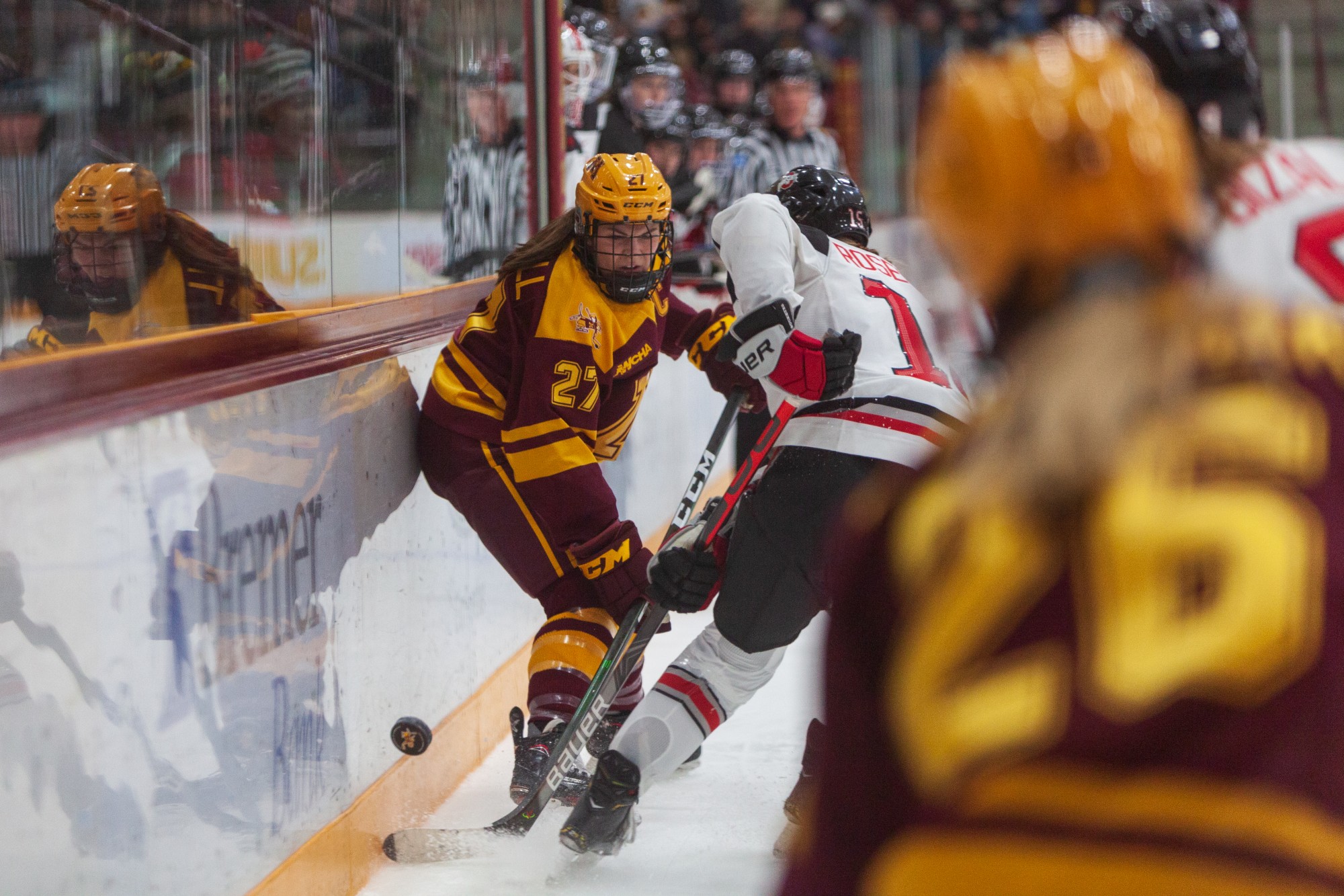 Gophers Defense Patti Marshall fights for the puck at Ridder Arena on Friday, Jan. 17.  Minnesota suffered a 1-4 loss to Ohio State. (Kamaan Richards / Minnesota Daily)