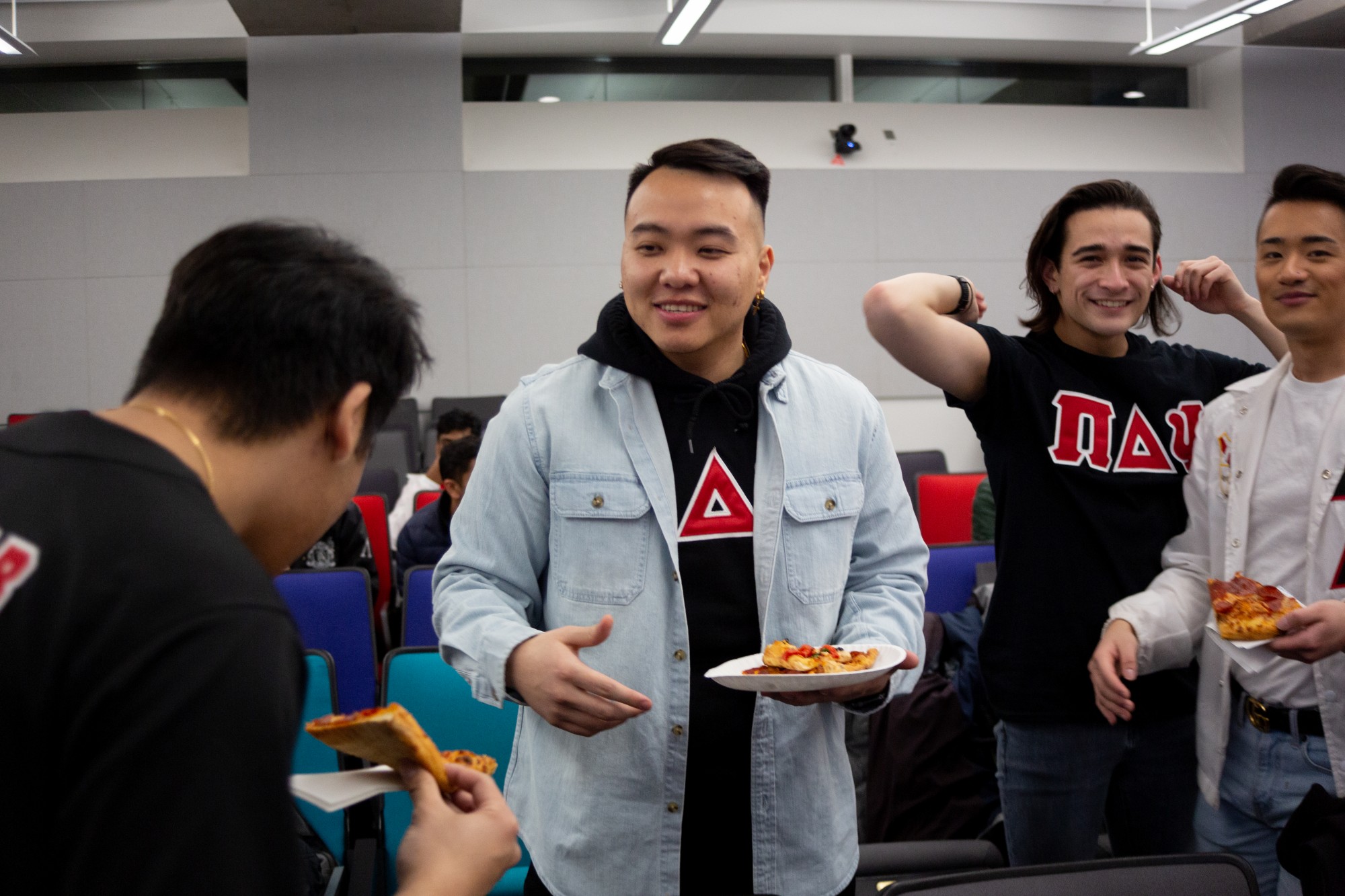  Members of the campus student greek life council meet in Bruininks Hall to discuss changes, plans for the future, and to welcome new members over pizza and music on Friday, Jan. 24, 2020. 