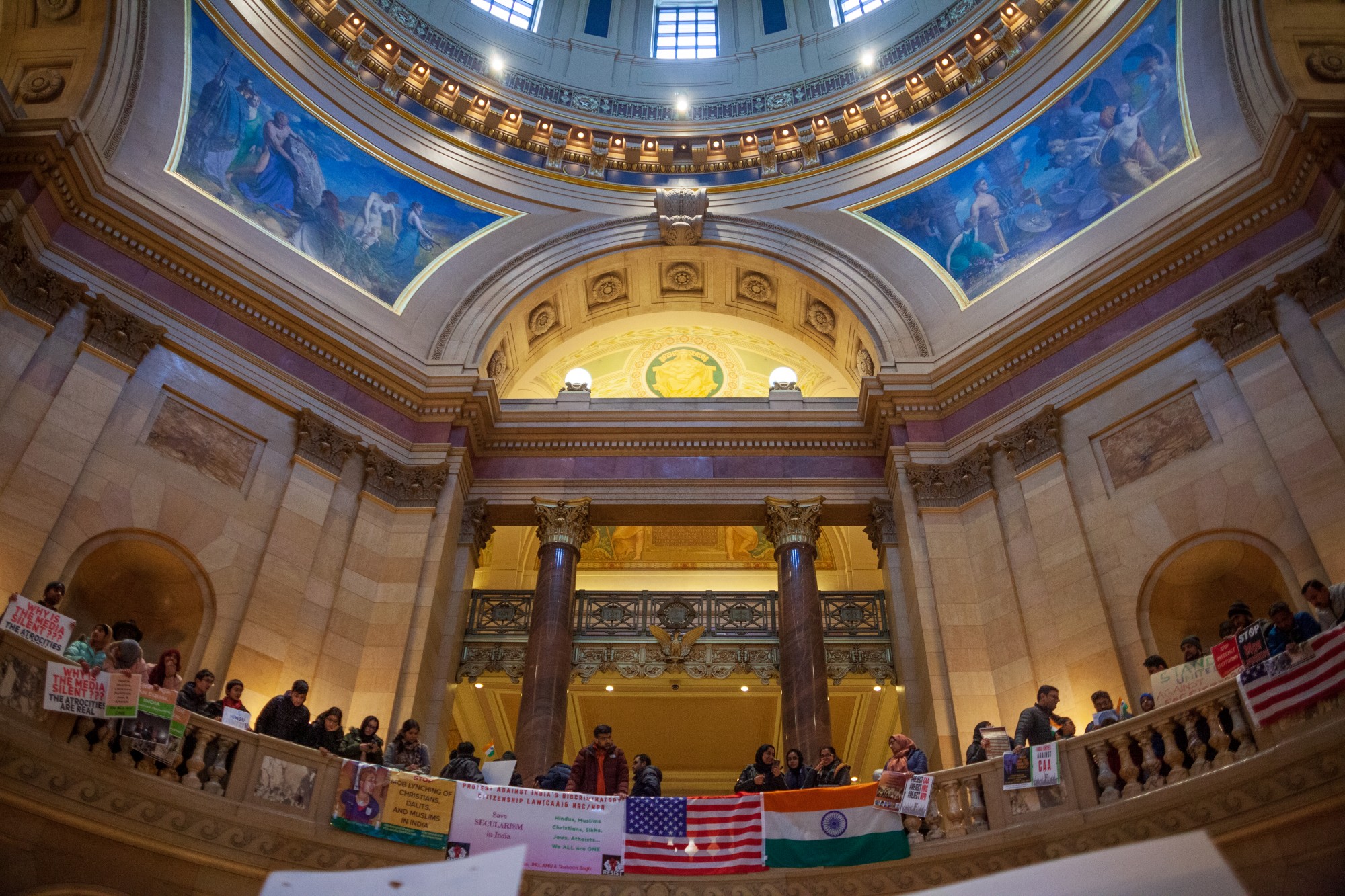 Attendees line the balconies of the rotunda at an event opposing Indias recent passage of the Citizenship Amendment Act at the Minnesota State Capitol Building on Sunday, Jan. 26. This legislation offers Indian citizenship to refugees of several religious groups, but does not apply to Muslims, despite their making up nearly 15% of the Indian population.