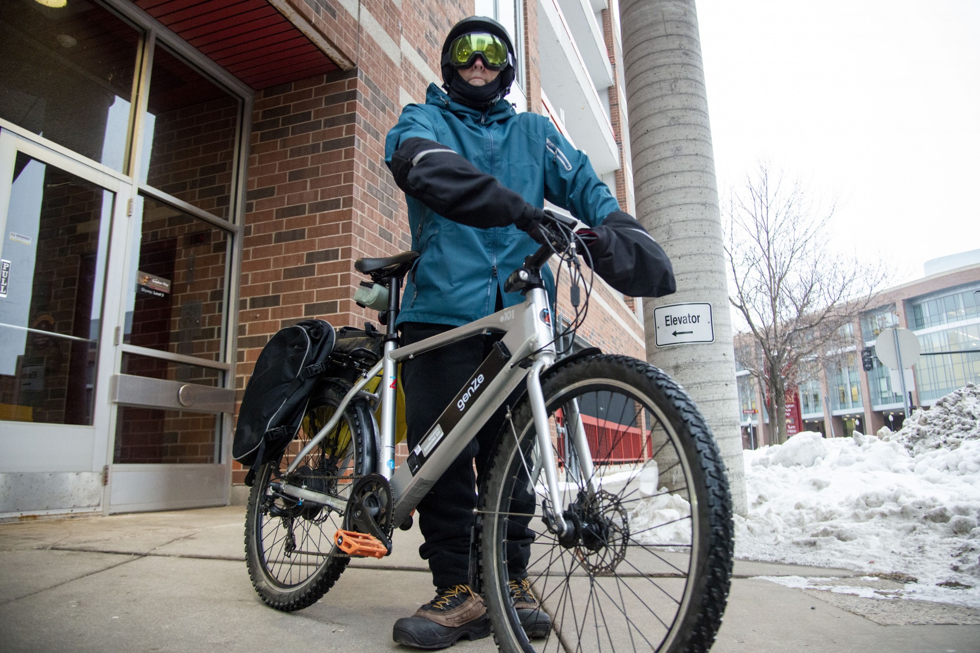 Alternative Transportation Manager Steve Sanders gets ready for his 9-mile commute home on Monday, Jan. 27. Sanders rides his bike to the university everyday, regardless of the weather. 