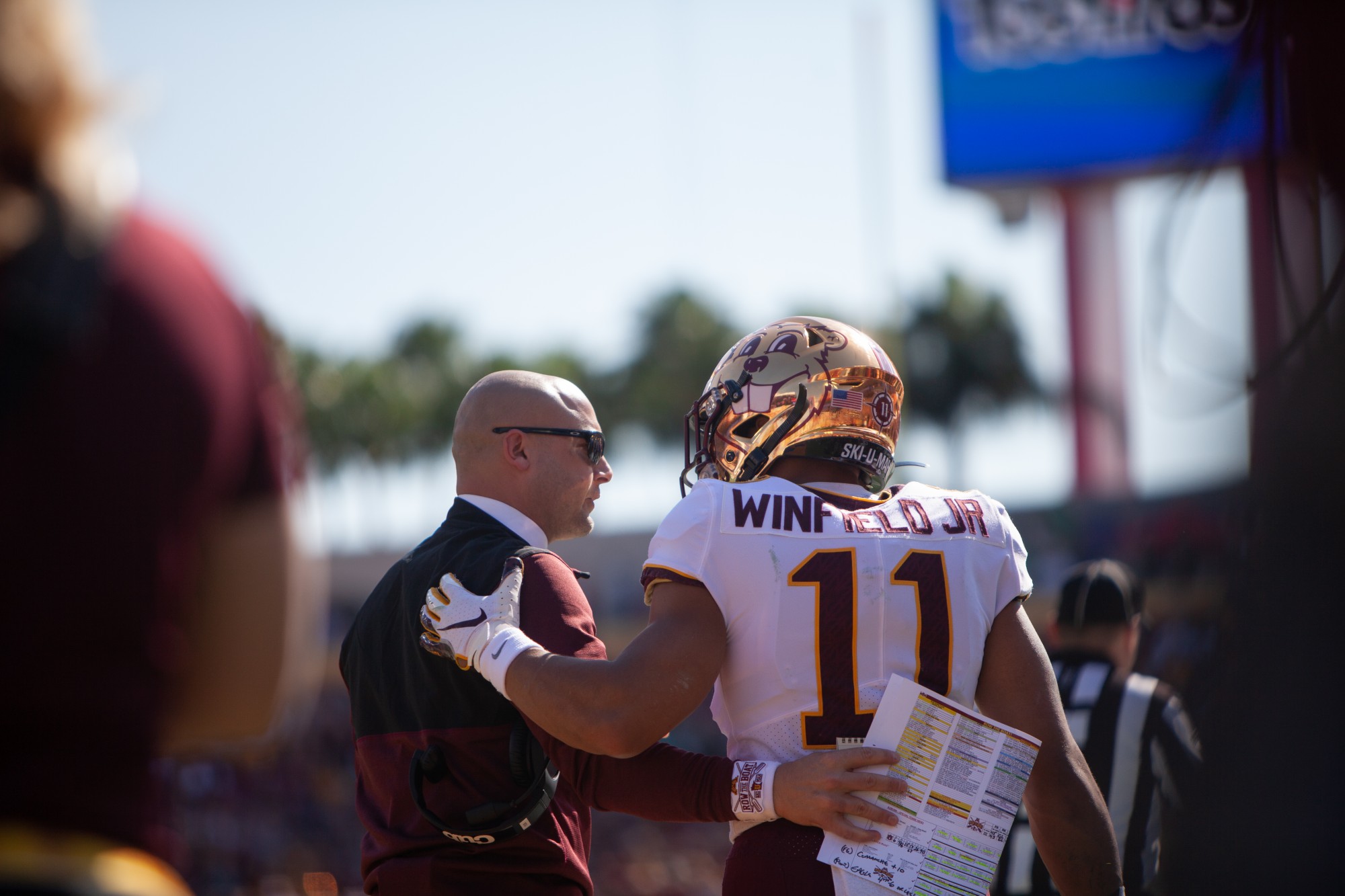 Gophers Head Coach P.J. Fleck converses with Defensive Back Antoine Winfield Jr. at Raymond James Stadium in Tampa, Florida on Wednesday, Jan. 1. Minnesota holds a 24-17 lead over Auburn heading into the third quarter of the Outback Bowl. (Kamaan Richards / Minnesota Daily)