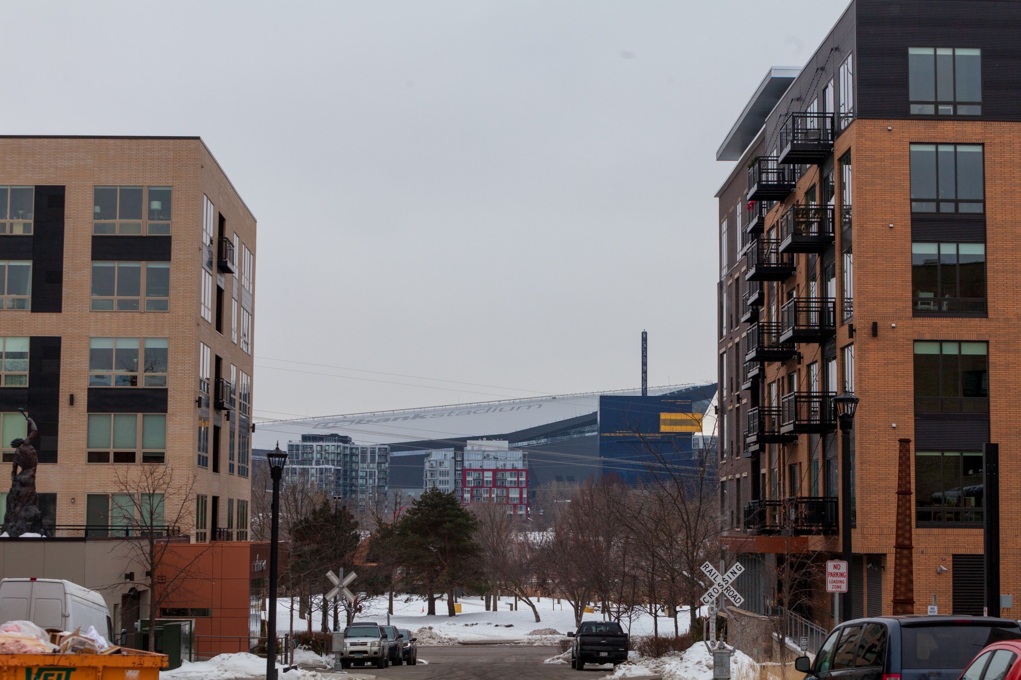 U.S. Bank Stadium is visible between apartment buildings in the Marcy Holmes neighborhood on Tuesday, Jan. 28.  The neighborhood provides housing for a significant number of University students.