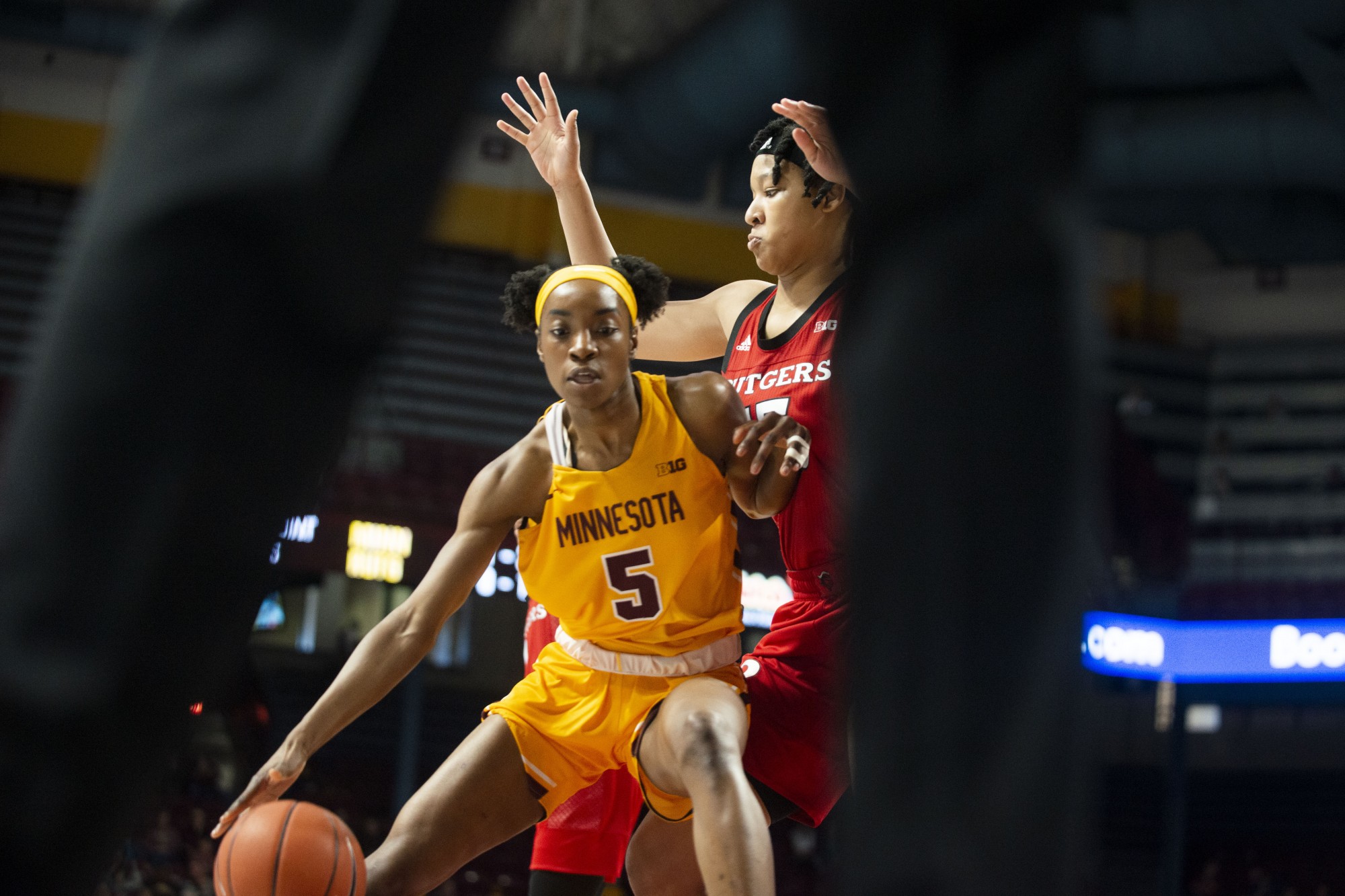 Forward Taiye Bello brings the ball up the court at Williams Arena on Sunday, Feb. 2. The Gophers won in overtime 73-71. 