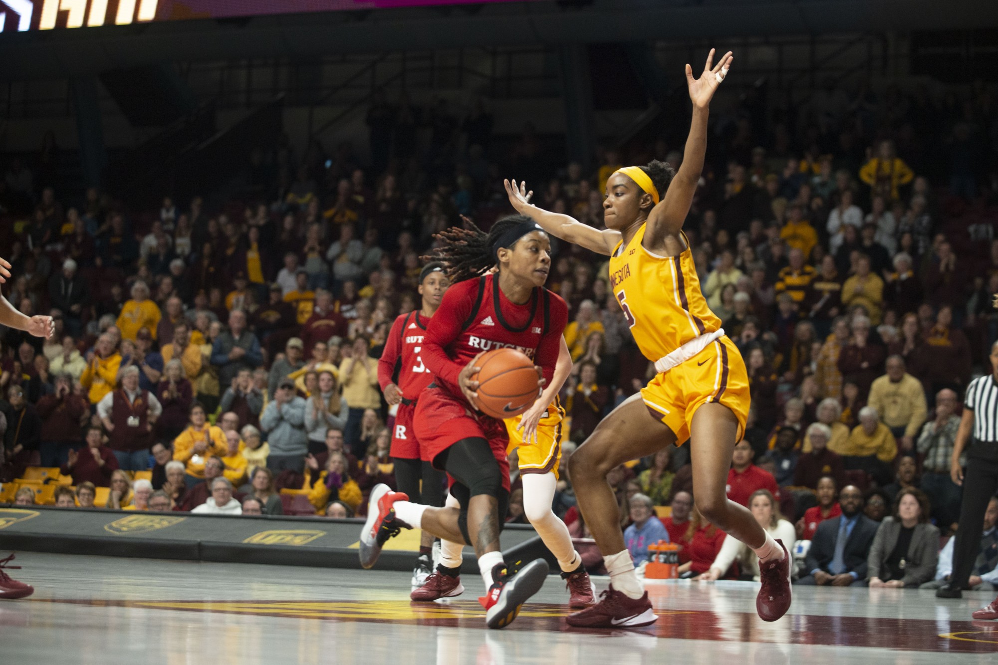 Forward Taiye Bello squares up on defense at Williams Arena on Sunday, Feb. 2. The Gophers won in overtime 73-71. 
