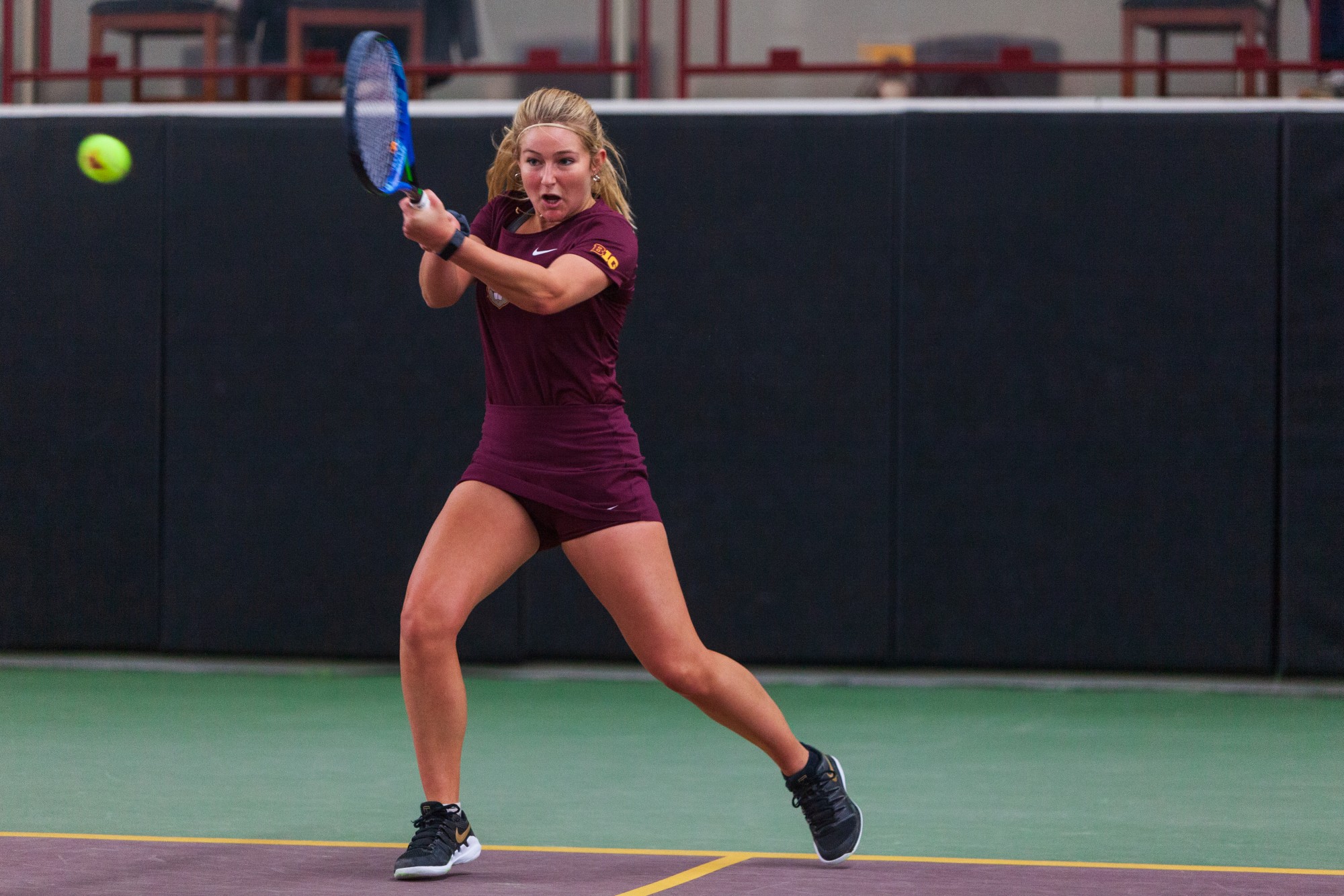 Gophers Junior River Hart returns a volley at the Baseline Tennis Center on Friday, Feb. 7.