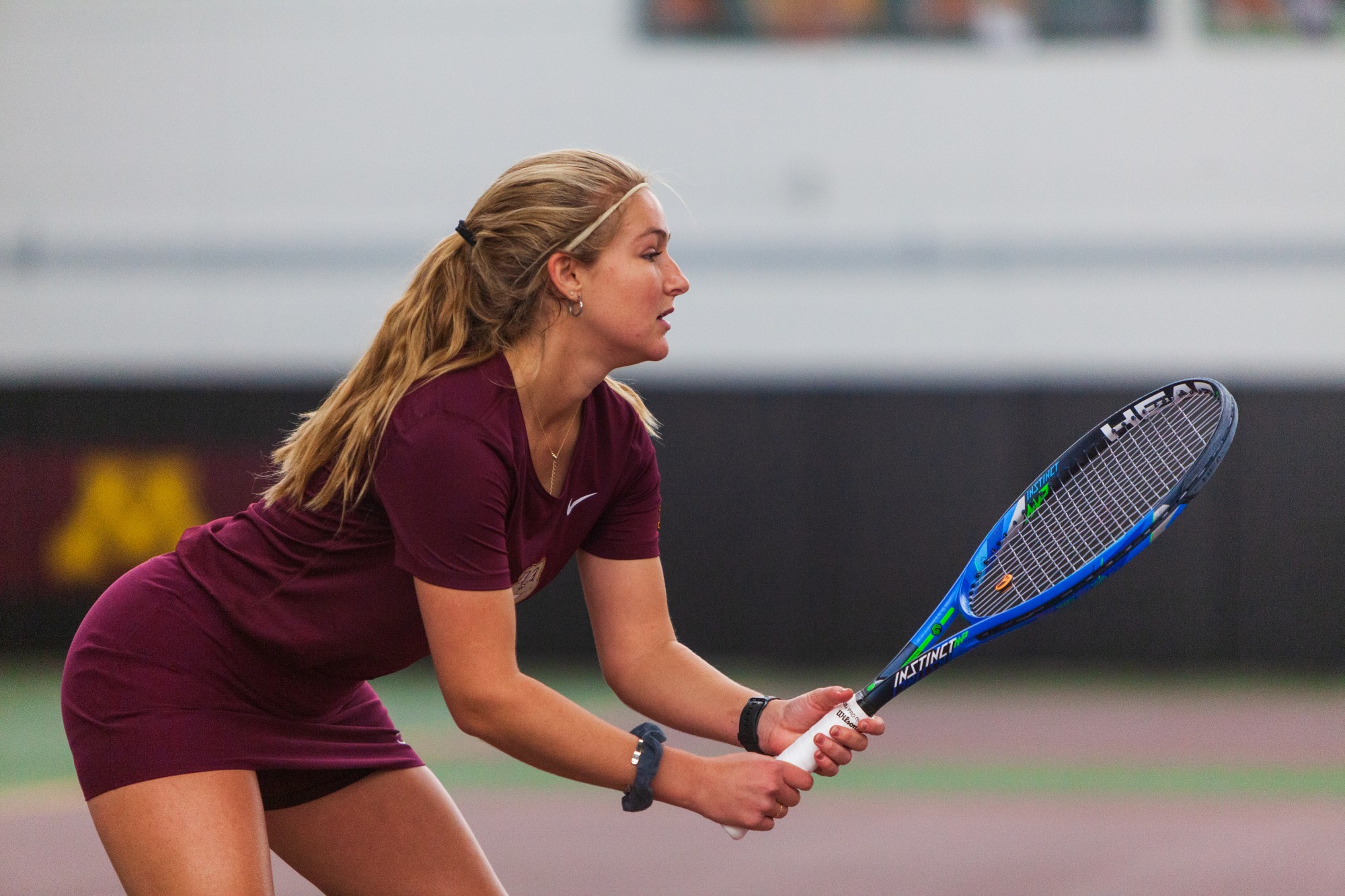 Gophers Junior River Hart awaits a serve at the Baseline Tennis Center on Friday, Feb. 7.