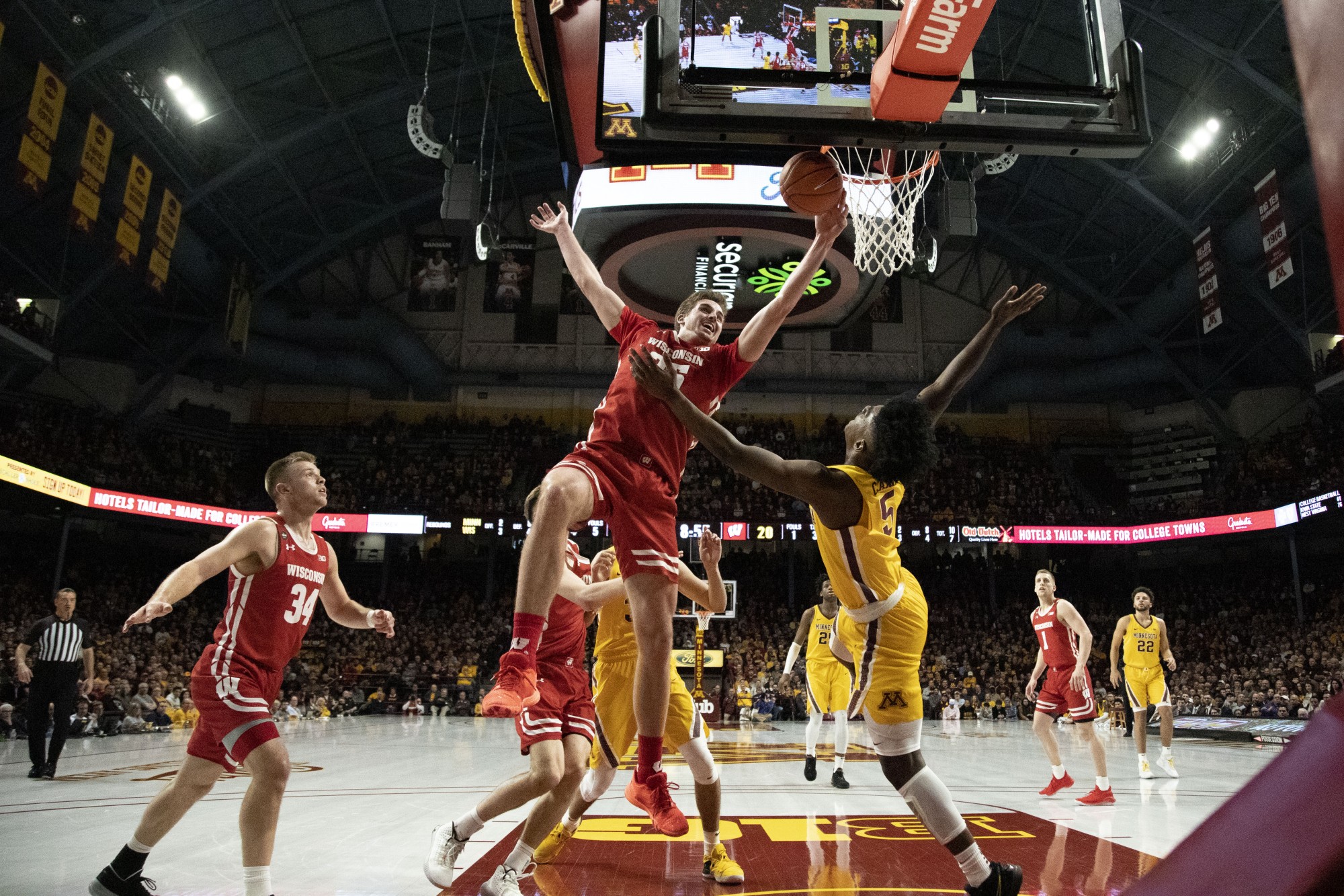 Guard Marcus Carr looks to block a layup at Williams Arena on Wednesday, Feb. 5. The Gophers beat the Badgers 70-52. 