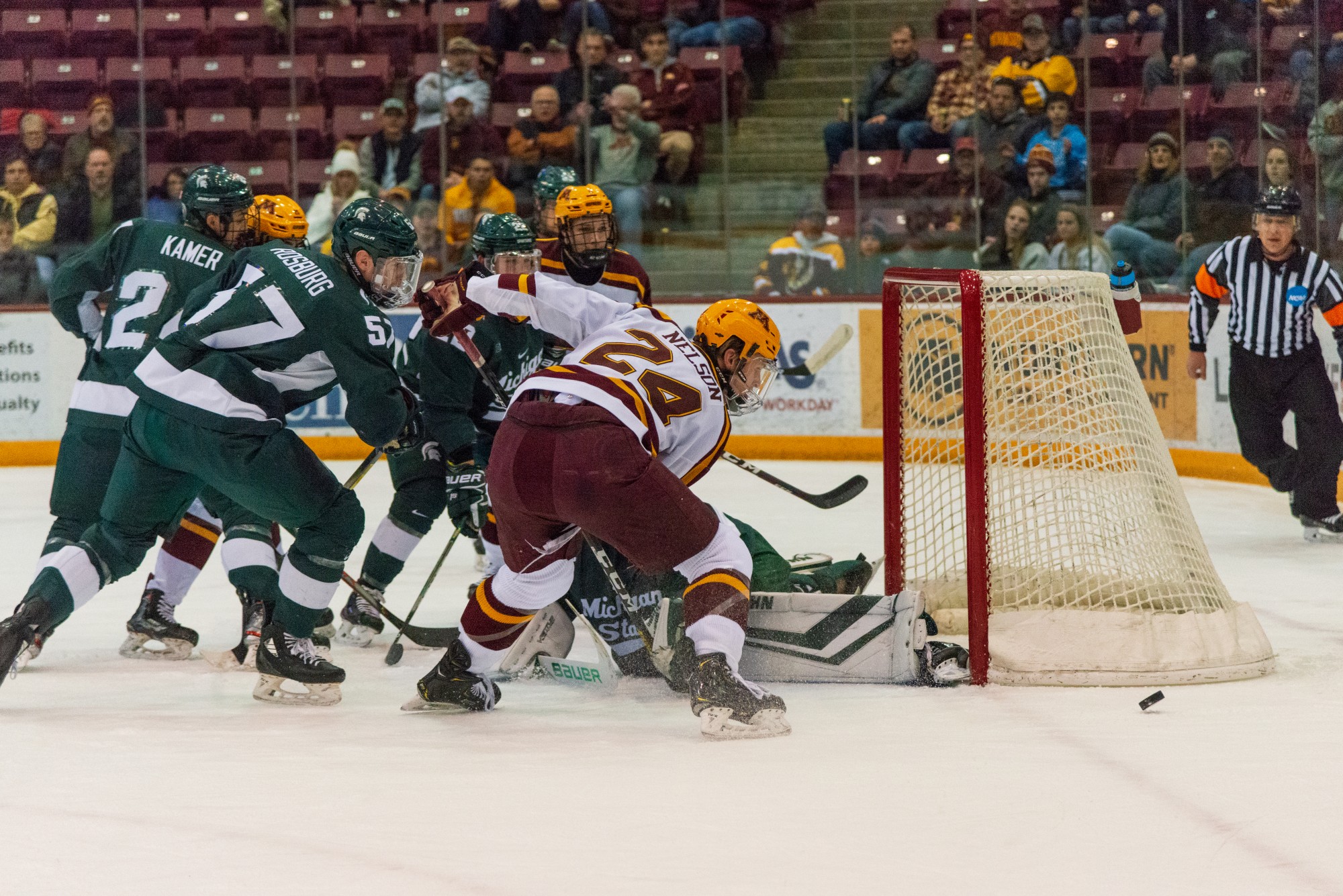 Gophers Forward Jaxon Nelson follows the puck after a goal attempt at the 3M Arena at Marriucci on Friday, Feb. 7, 2020. Gophers won against Michigan State 4-1.