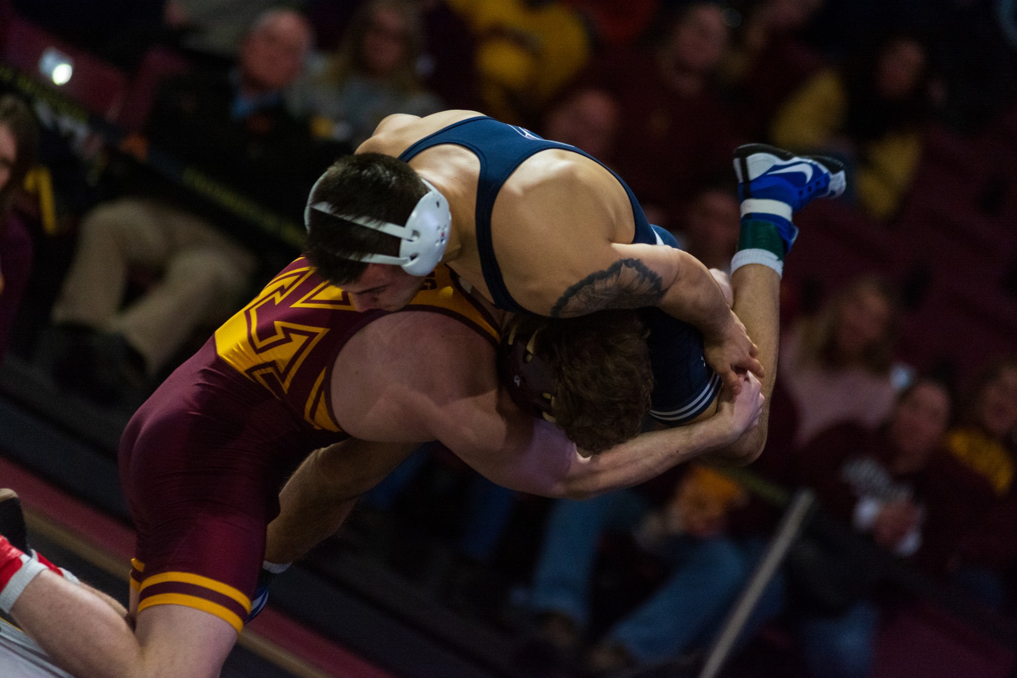 Gophers Redshirt Sophomore Bailee O’Reilly takes down his opponenet at Maturi Pavilion on Sunday, Feb. 9. The Gophers lost to Penn State 31-10.