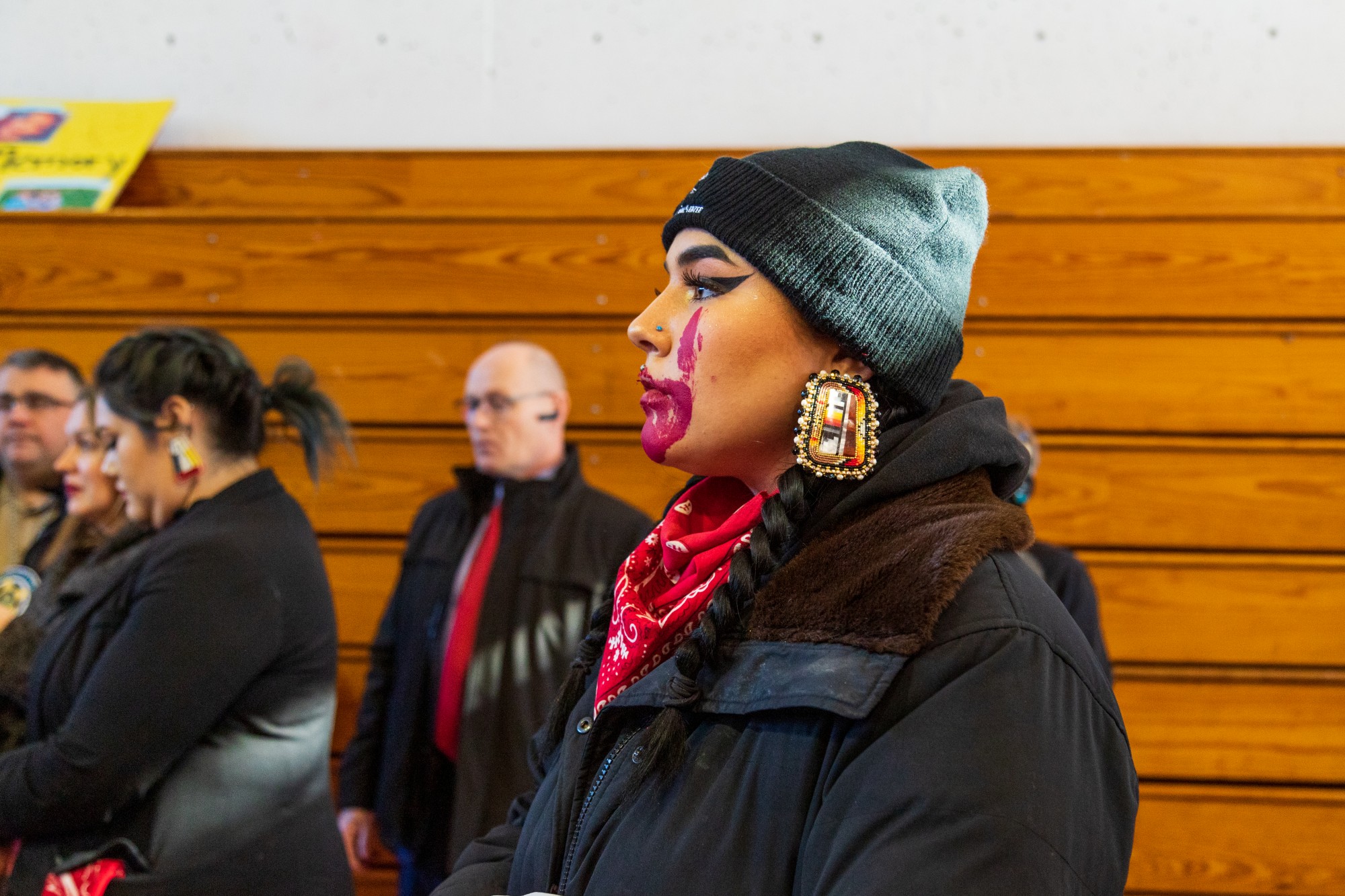 Attendee Kennedy German observes the proceedings at the Minneapolis American Indian Center on Friday, Feb. 14.  The event was held in honor of missing and murdered Indigenous women and to raise awareness of other issues in the community.