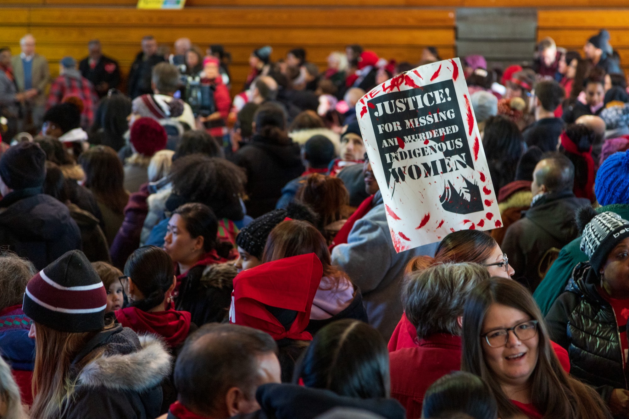 A crowd gathers to march to raise awareness for missing and murdered Indigenous women at the Minneapolis American Indian Center on Friday, Feb. 14.