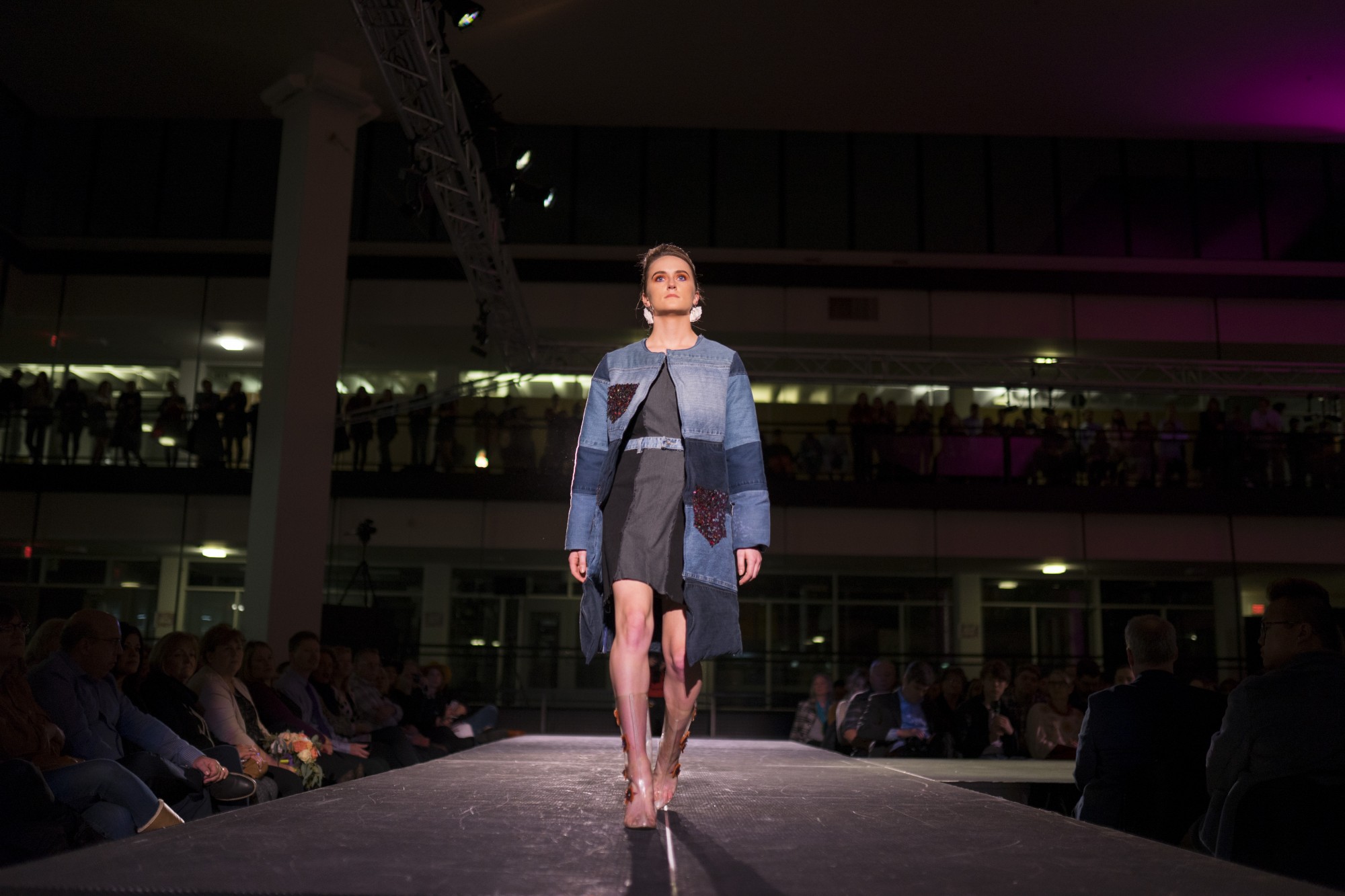 A model showing Designer Andrea Dunruds work walks the runway at the Amplified fashion show at Rapson Hall on Saturday, Feb. 15. The show features designs by University of Minnesota apparel design seniors.