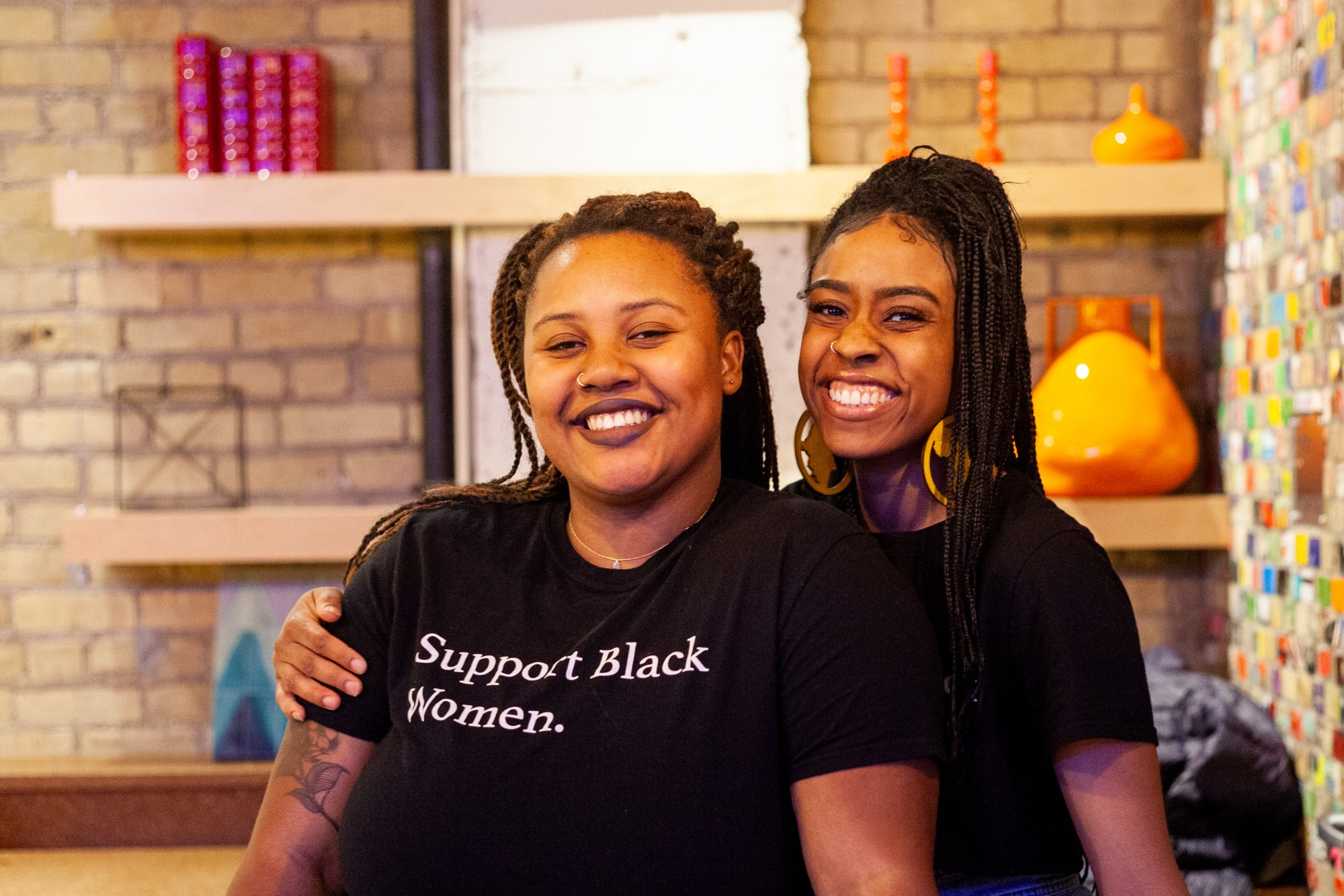 Co-organizers ZaNia Coleman, left, and Ricki Williams pose for a portrait at the Tangible Thoughts Open Mic event at A-Mill Artist Lofts on Saturday, Feb. 15. The recurring event serves as a platform to highlight Black thought and expression in the Twin Cities.