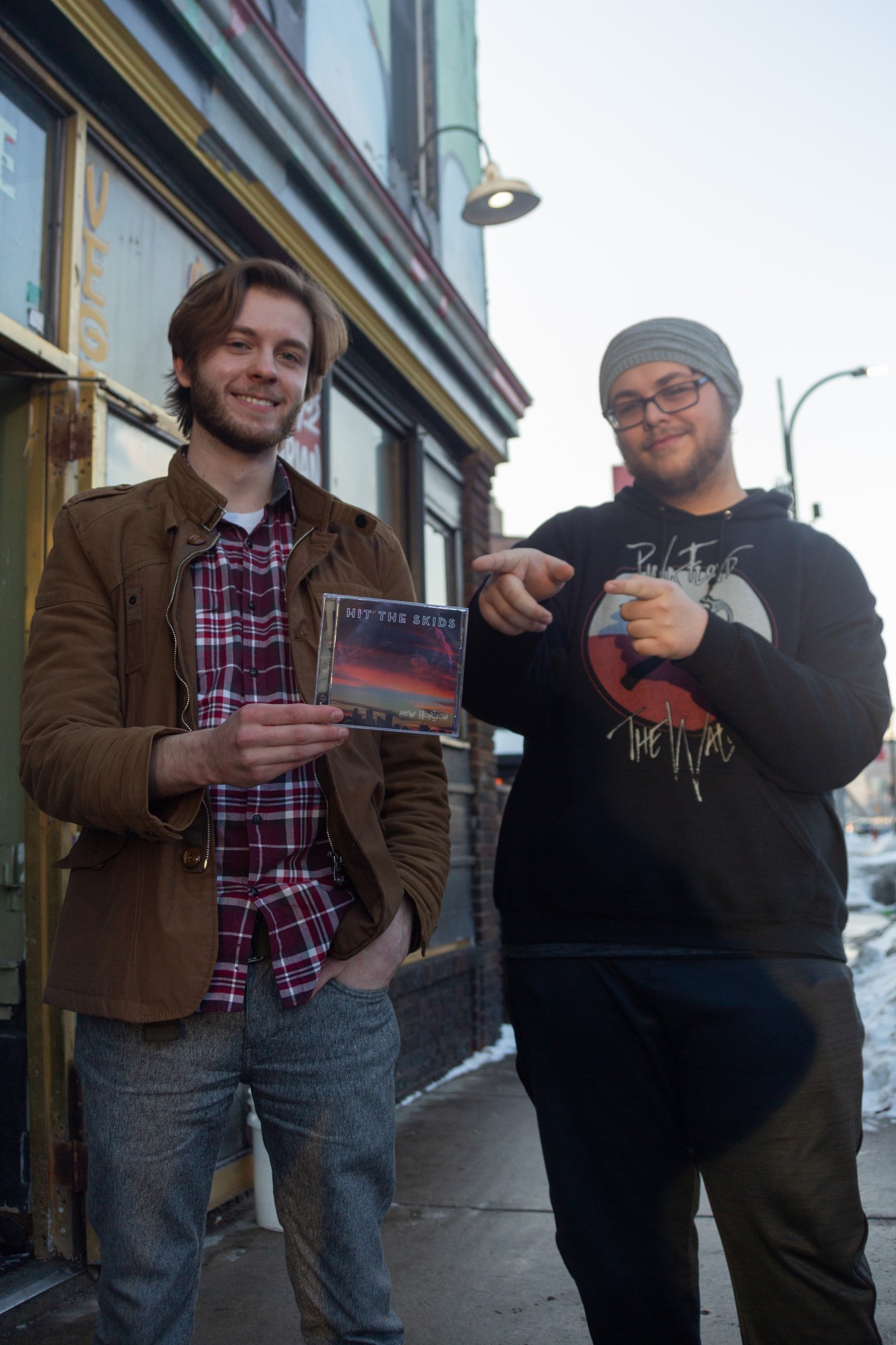 Musicians Alex Fuller and Jake Yaeger, members of the local alt-rock band Hit the Skids, pose outside of Hard Times Cafe on Feb. 21, 2020. The band is set to release a new album entitled New Horizon and will play in the Universitys Battle of the Bands.