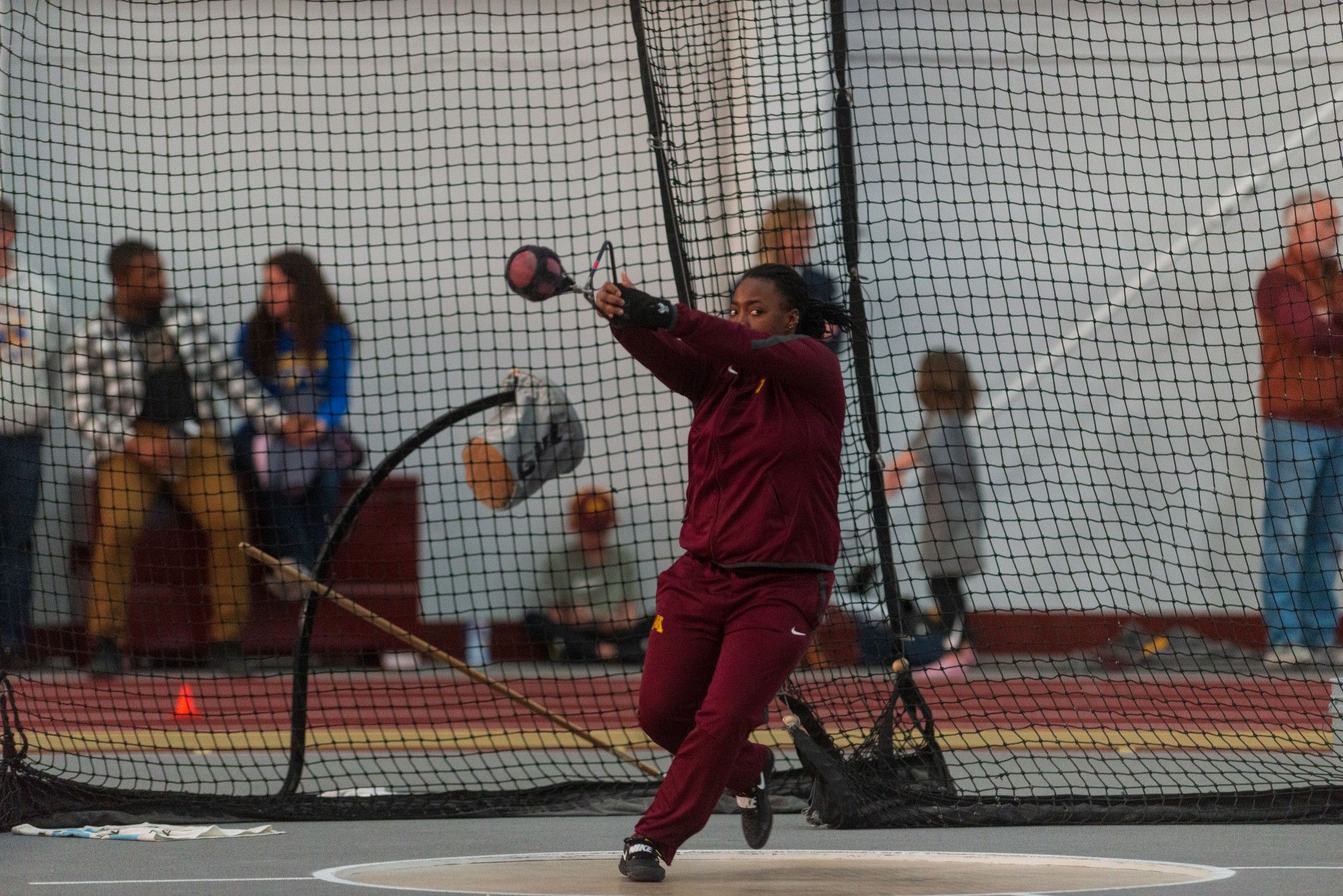 Gophers Junior Devia Brown competes in the weight throw at the Minnesota Cold Classic at the University of Minnesota Fieldhouse on Friday, Feb. 21.