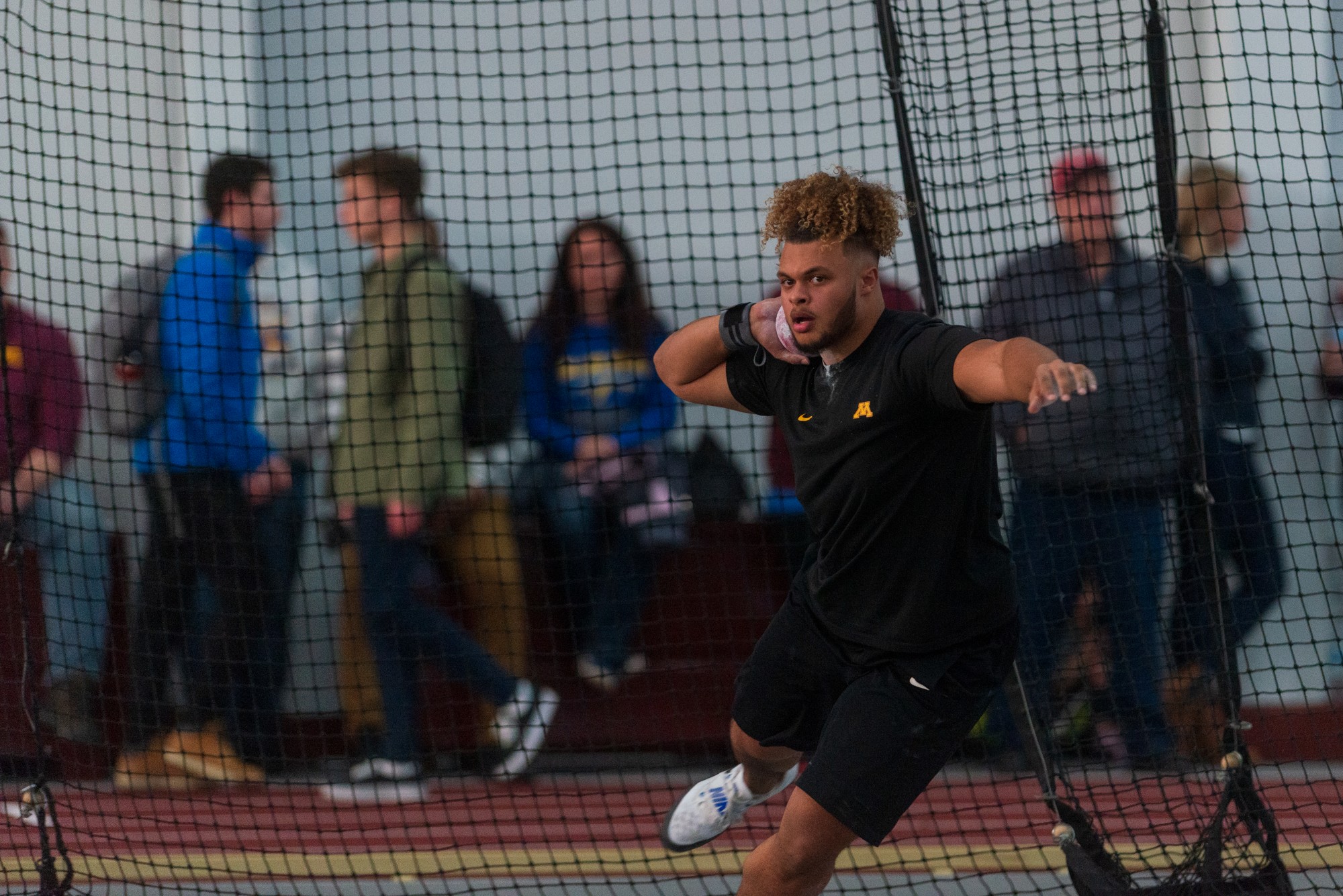 Gophers Freshman Kyle Atkinson competes in the shot put at the Minnesota Cold Classic at the University of Minnesota Fieldhouse on Friday, Feb. 21.